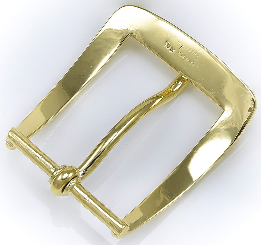Solid heavy gauge  yellow gold belt buckle.  Made and signed by CARTIER.
Exceptionally well-made.  1 3/4