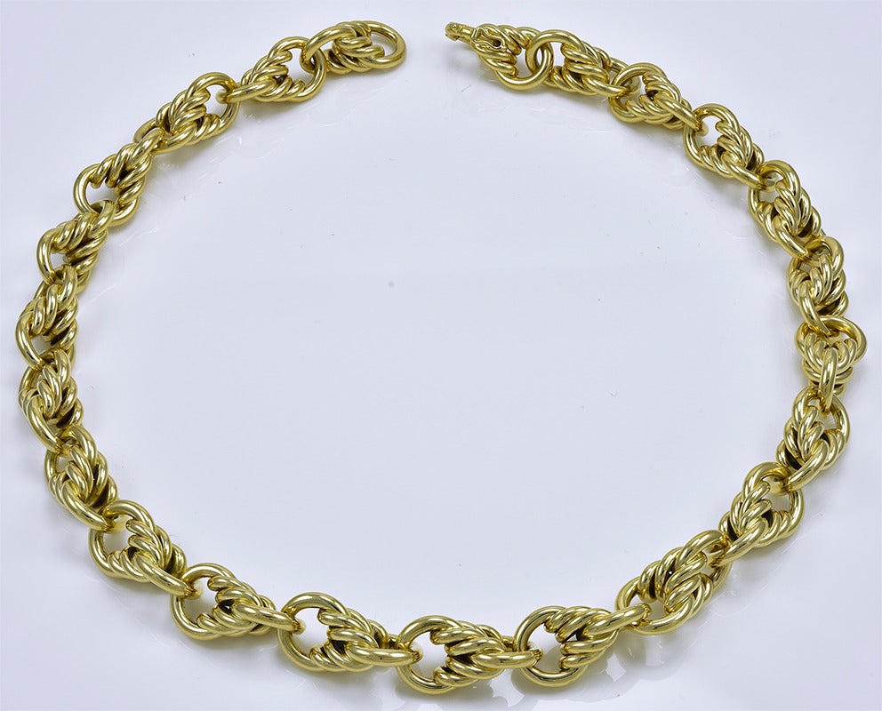 Heavy, beautiful link necklace by Tiffany & Co. 18K shiny yellow gold links, offset with braided pattern double links.  16-1/2