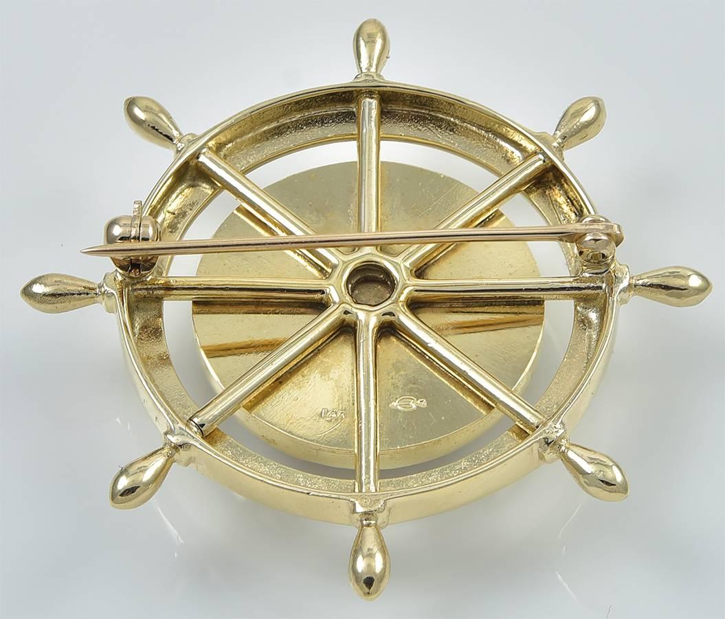 Bright large reverse crystal pin. Figural ship's wheel with the nautical alphabet spelled out. Pristine condition. 1-3/4