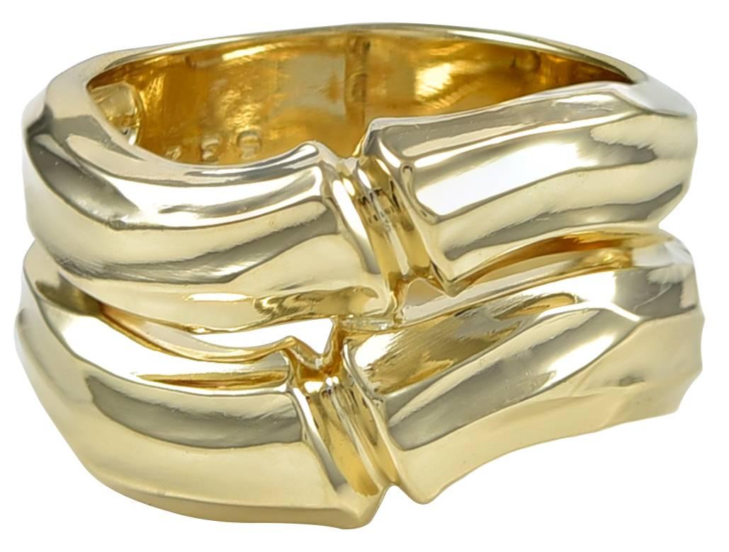 Double bamboo 18K gold band. Made, signed & numbered by Cartier. Approximately 1/2