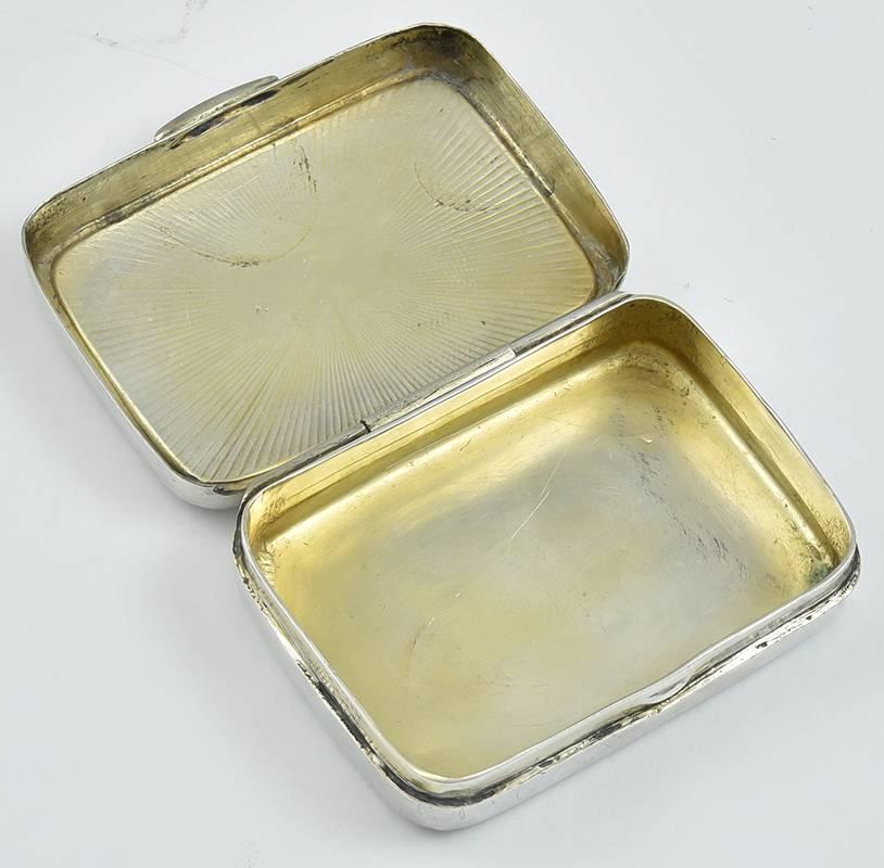 Adorable enamel hinged sterling silver box,  with a sweet sitting gray and white kitten. Framed with white guilloche radiating lines.  Lemon gilt interior. 1 1/4
