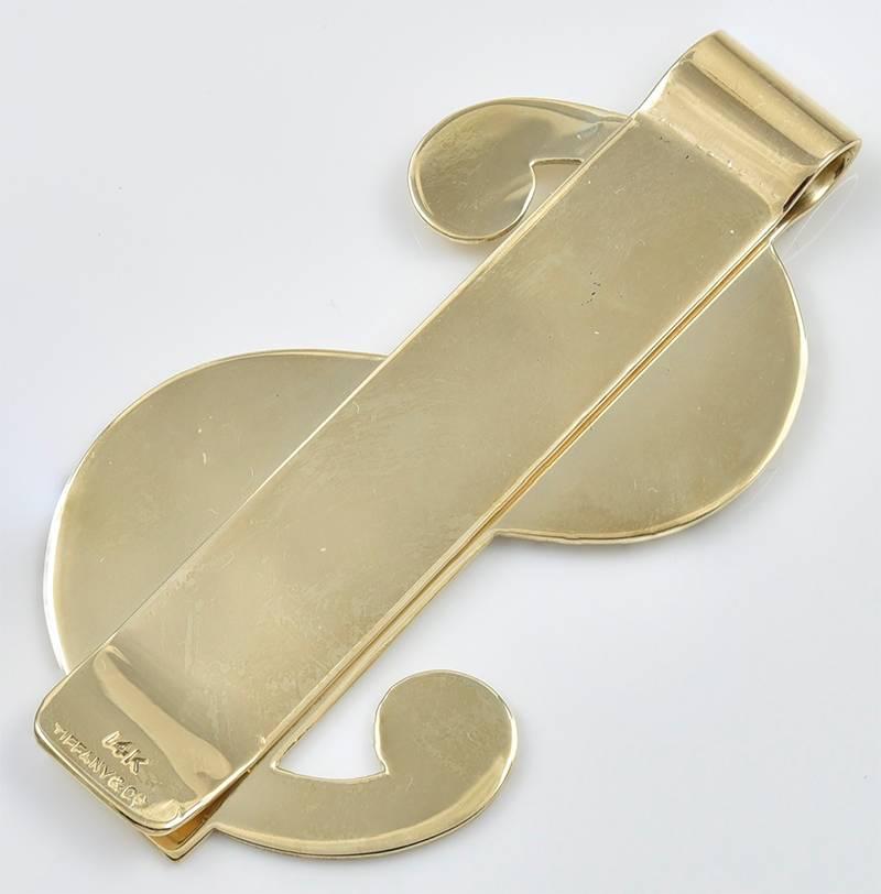 Jumbo figural dollar sign money clip.  Made and signed by TIFFANY & CO. 
14K yellow gold.  2 1/4
