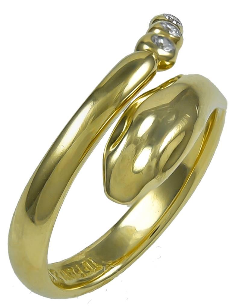 Figural serpent ring.  Made and signed by Elsa Peretti for TIFFANY & CO.  18K yellow gold with three faceted diamonds set in the tail.  Size 3 1/2 -- perfect for a slinky pinky ring.

Alice Kwartler has sold the finest antique gold and diamond