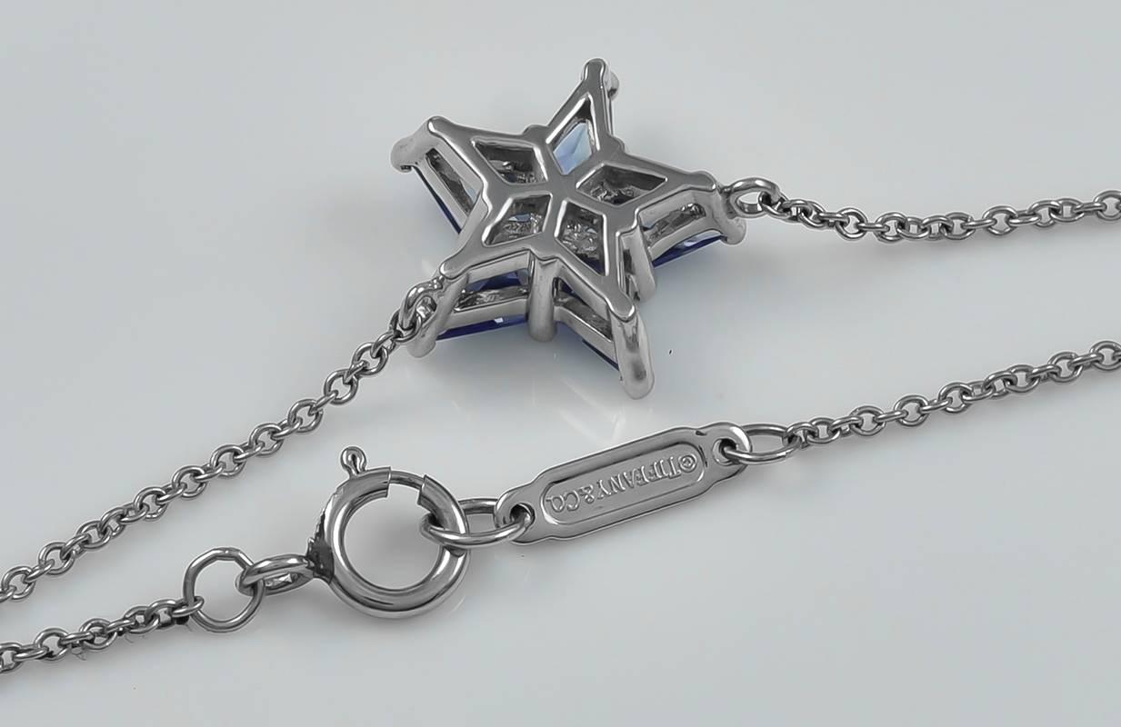 Lovely sapphire figural star pendant.  Made and signed by TIFFANY & CO.  1/2.