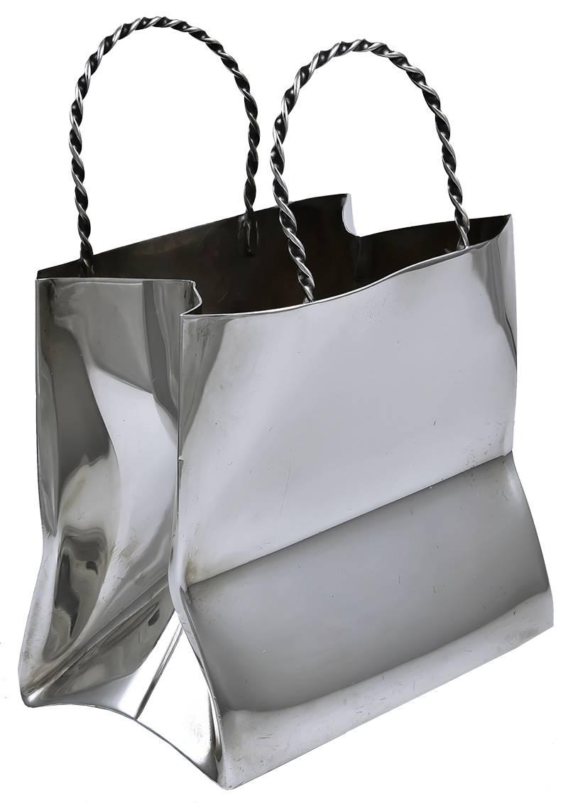 Sterling silver figural shopping bag.  Made and signed by CARTIER.  3