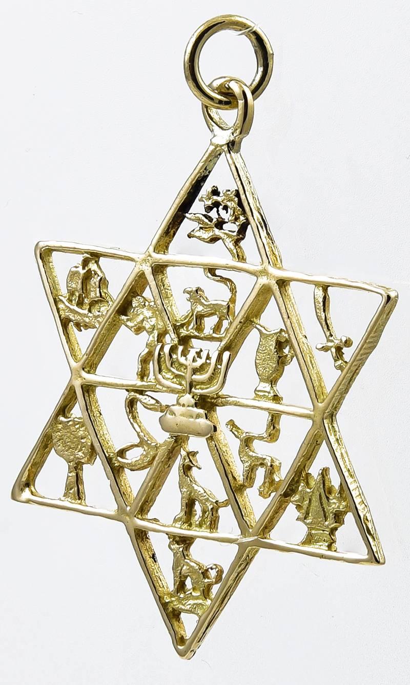 Large Star of David, depicting the Twelve Tribes of Israel.  14K yellow gold.  
1 1/4