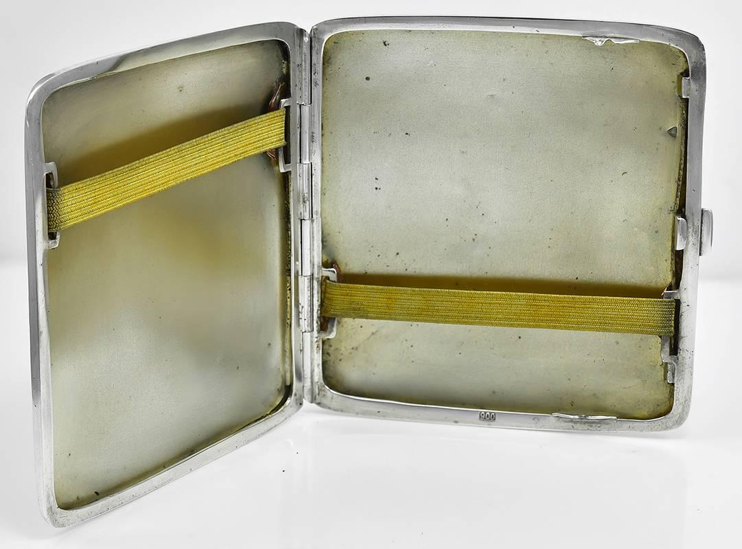 Brilliant guilloche green and white enamel hinged cigarette case.  Sterling silver.
3 1/8