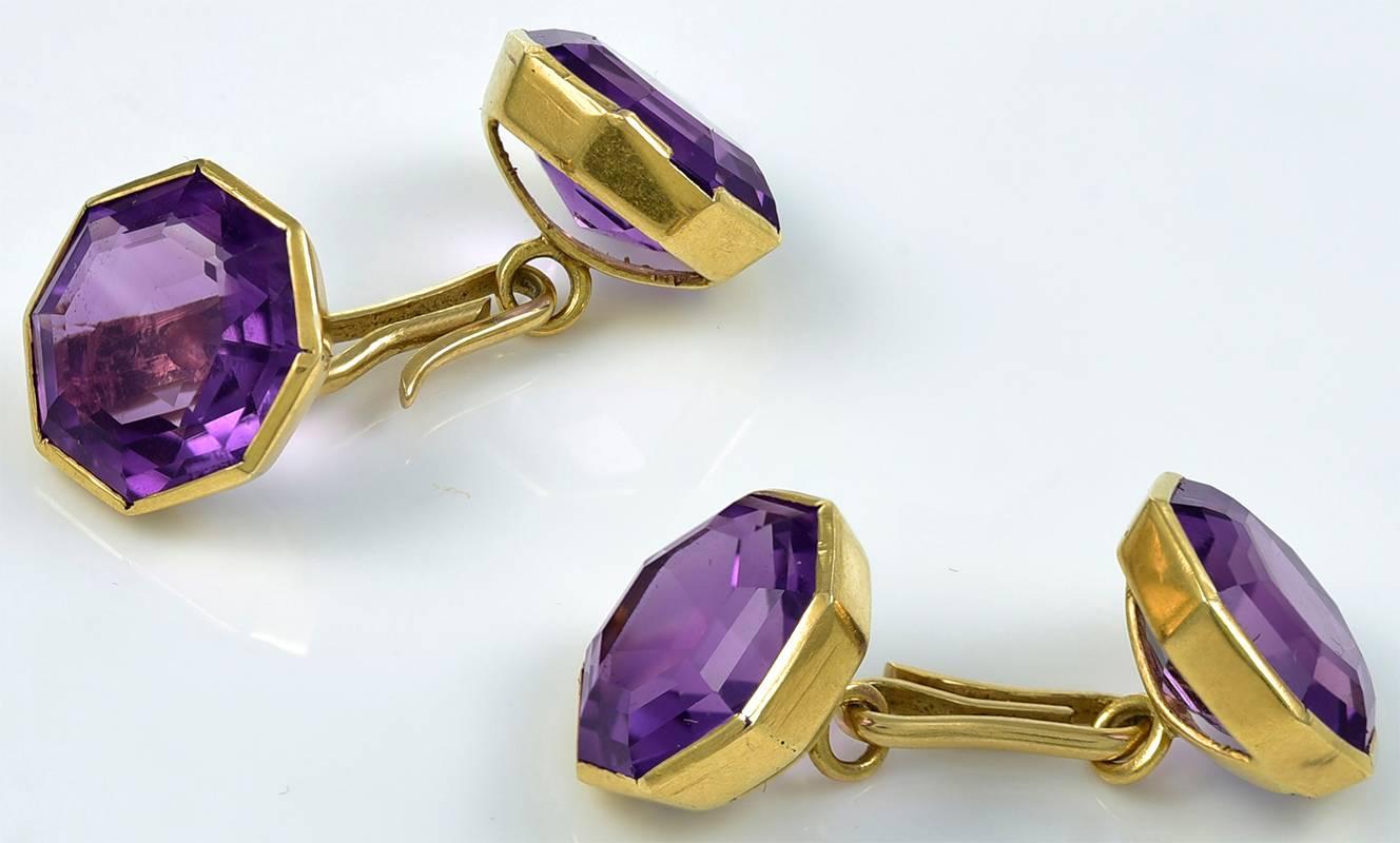 Big and beautiful double-sided cufflinks.  Octagonal faceted amethysts, with brilliant saturated color.  Set in 18K gold, with a hint of rose color.  1/2