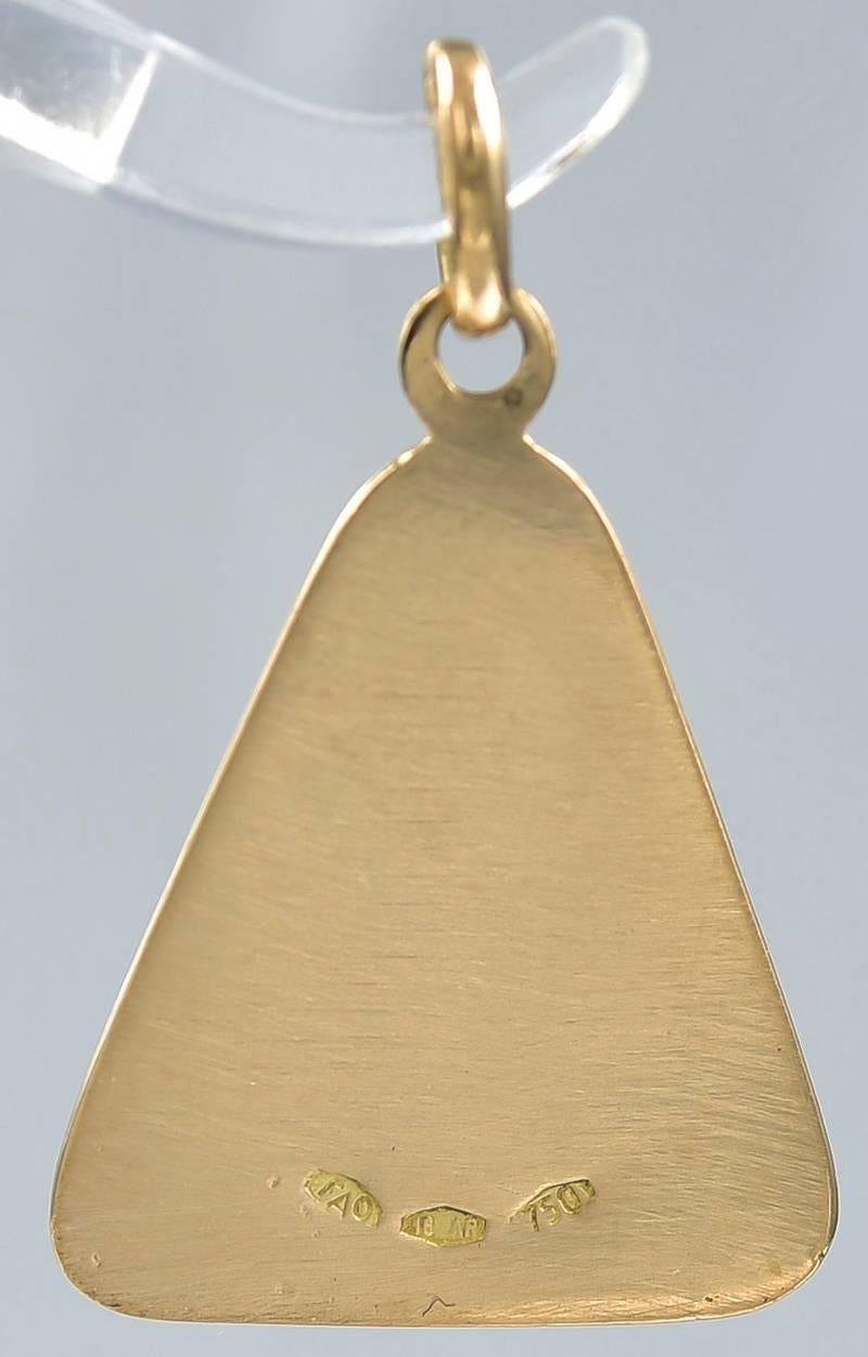 Unusual shape "St. Christopher's" medal. 18K yellow gold.  Applied border. 1" x 3/4."  Very fine.

Alice Kwartler has sold the finest antique gold and diamond jewelry and silver for over forty years.