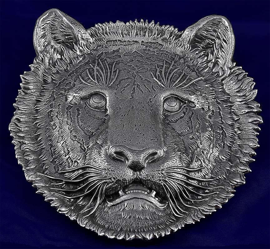 Fabulous figural:  A finely-detailed three-dimensional figural "lion head" tray.  Made an signed by BUCCELLATI.  Sterling silver.  6 3/4" x 7 3/4."  A striking, stunning representation of a Leo.

Alice Kwartler has sold the