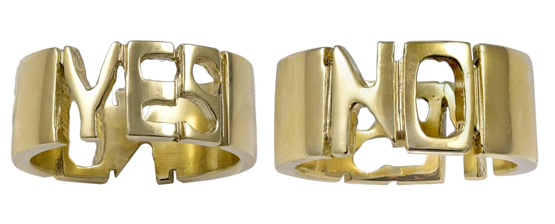 18K yellow gold "mood ring."  Cut-out letters spell out "YES" on the front and "NO" on the back.  This ring is made to order; we can make any size for you.  Great fun to wear.

Alice Kwartler has sold the finest antique
