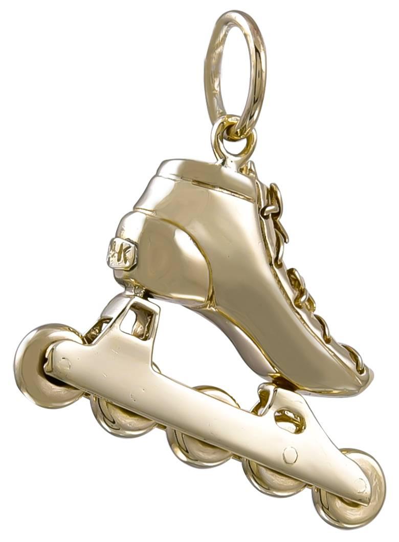 Unusual figural "rollerblade" charm.  Solid gauge 14K yellow gold.  Well-detailed and well made.   1 1/4" x 3/4."

Alice Kwartler has sold the finest antique gold and diamond jewelry and silver for over forty years.