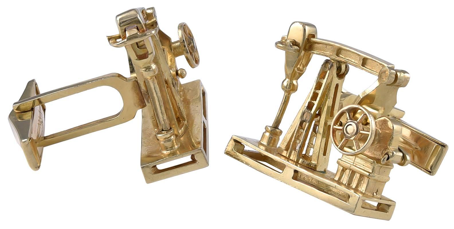 Large custom-made figural "oil well" cufflinks. 14K yellow gold.  The crank turns to move the "Pitman Arm" connecting to the walking beam, which pulls oil from the articulated pump jack.  T-bar back closure; very easy to put on. 