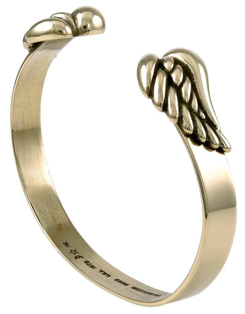 Bangle bracelet, with angel wing motif.  Made and signed by KIESELSTEIN-CORD.  14K yellow gold.  For a small to medium sized wrist.  A memento of love and protection.

Alice Kwartler has sold the finest antique gold and diamond jewelry and silver