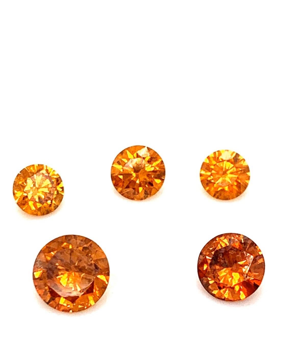 Suite of lose round brilliant orange diamonds weighing 3.20 carat total weight.
unique collectible/investment opportunity.
Suite of extremely rare natural orange diamonds, all certified by the GIA as natural and untreated also graded by the GIA as