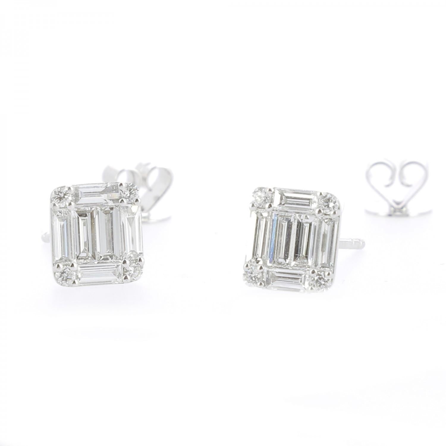 A wonderful Illusion Emerald-Cut Diamond Earrings, set with 12 Baguettes Diamonds weighing 0.68 Carats and 12 Rounds Diamonds weighing 0.09 Carats.
Totally the Fashion Diamond Earrings weights 0.77 Carats.
The Diamonds are GVS qualities.
The