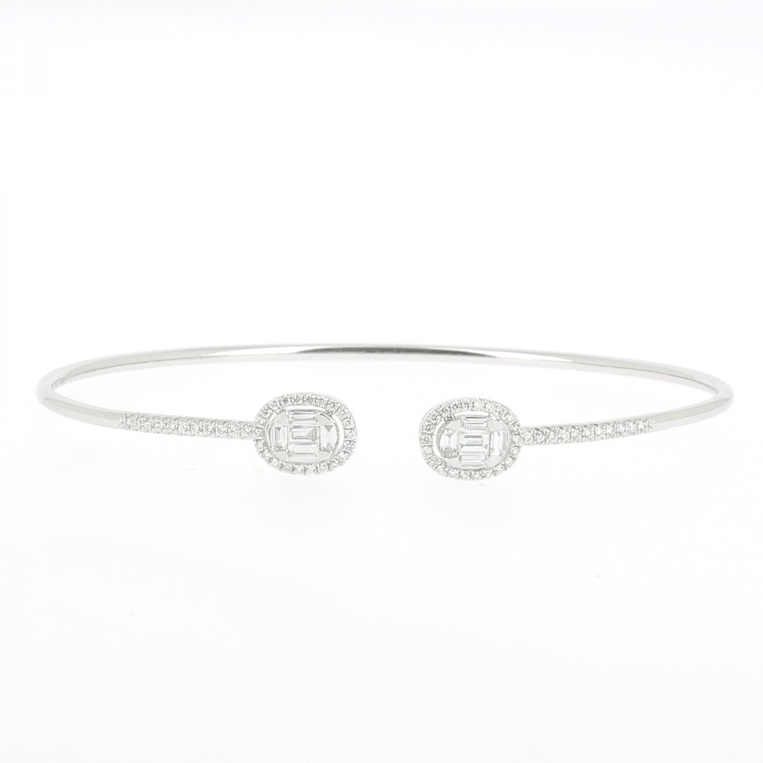 A wonderful Diamond Bangles Bracelet set with Rounds Diamond and Baguettes Diamonds.
The Bracelet counts 10 Baguettes Diamonds and 66 Round Diamond weighing totally 0.51 Carats.
The Diamonds are GVS quality.
The Bangle Bracelet is 18K White