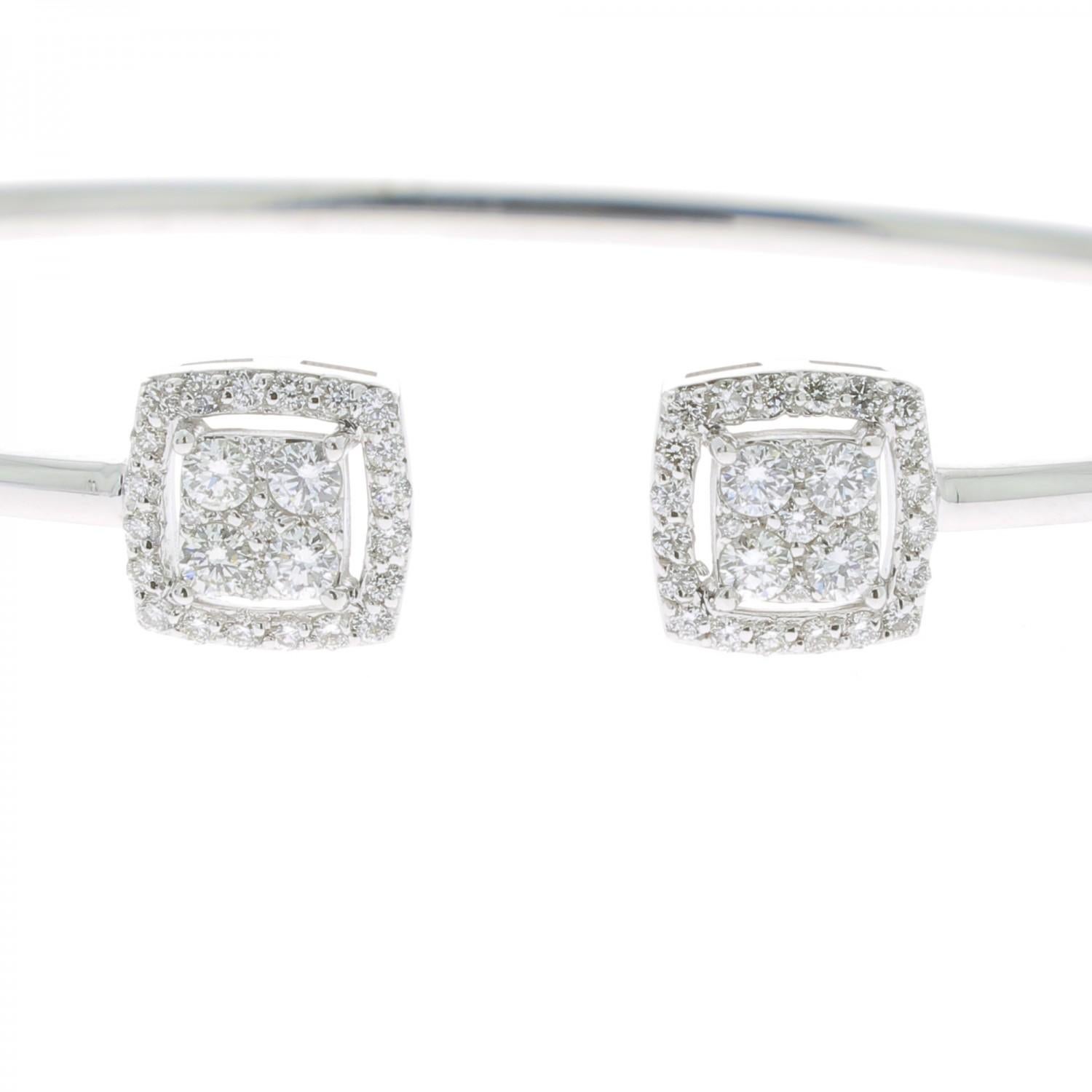 A wonderful Diamond Bangles Bracelet set with Round Diamonds weighing 0.61 Carats.
The Diamonds are GVS quality.
The Bangle Bracelet is 18K White Gold.
The Diamond Bracelet weight 4.20 Grams.
The Diameter of the Bracelet is 5.5 Cm/ 2.16 In. 
