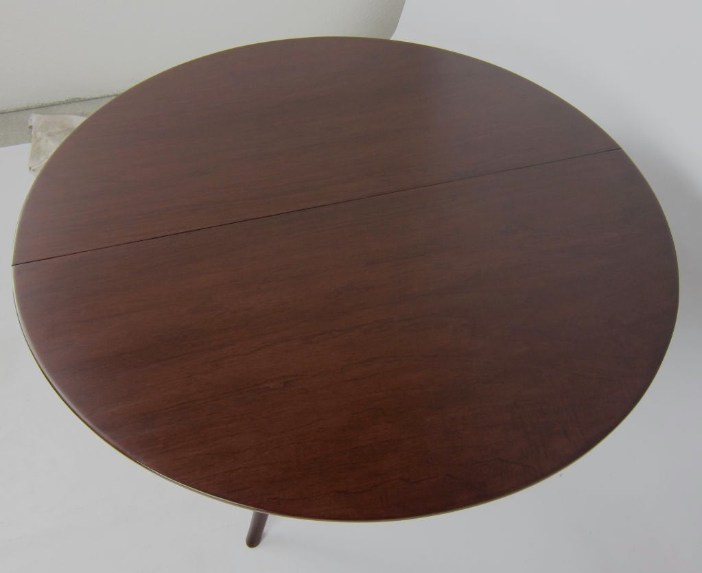 Saber Leg Extension Dining Table at 1stDibs