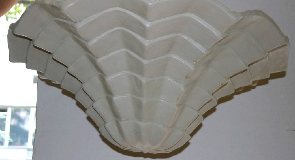 plaster patch behind light fixture