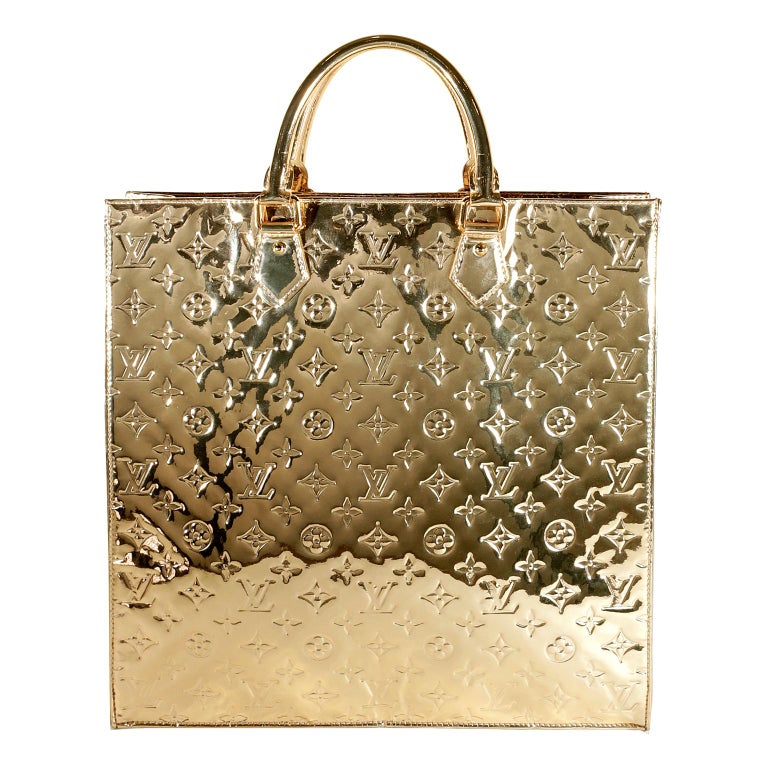 lv bag with gold plate