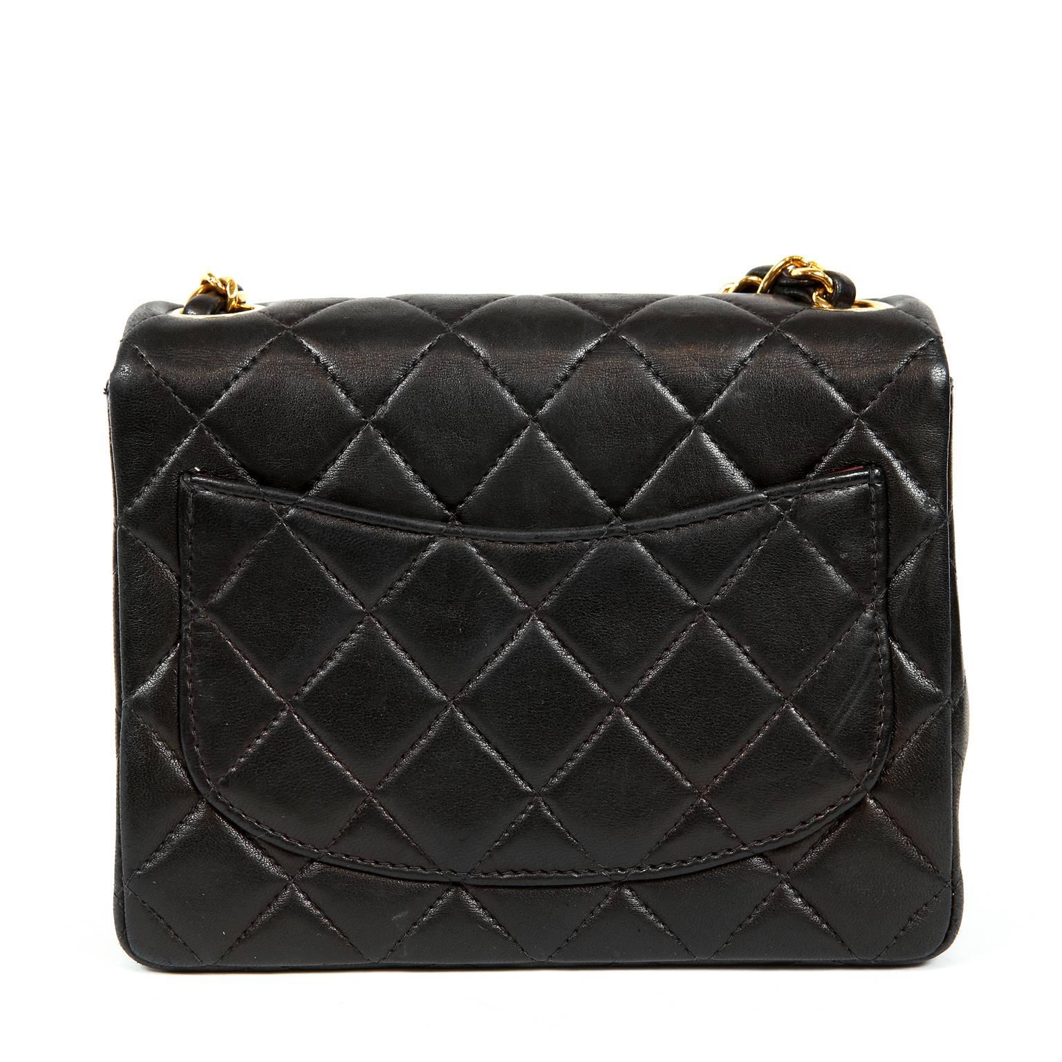 Chanel Black Lambskin Mini Classic Flap Bag- Excellent Plus
 This Vintage Chanel Black Lambskin Mini Classic is a fantastic find in beautiful condition.  From the late 1990’s, the Mini Classic has never been more popular thanks to its classic design