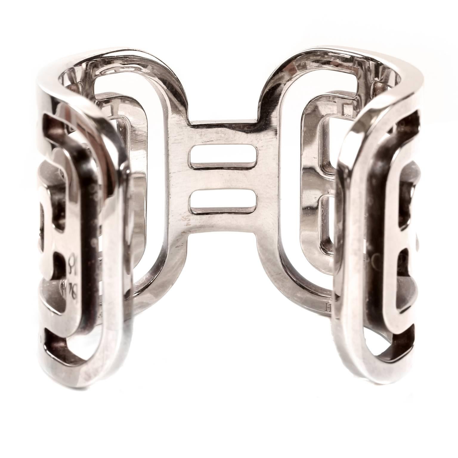 Hermès Sterling Silver Aztec Cuff Bracelet- MINT condition. 
Wide silver cuff is substantial, yet elegant thanks to the open geometric Aztec inspired pattern.  Hermès pouch included.
A251

