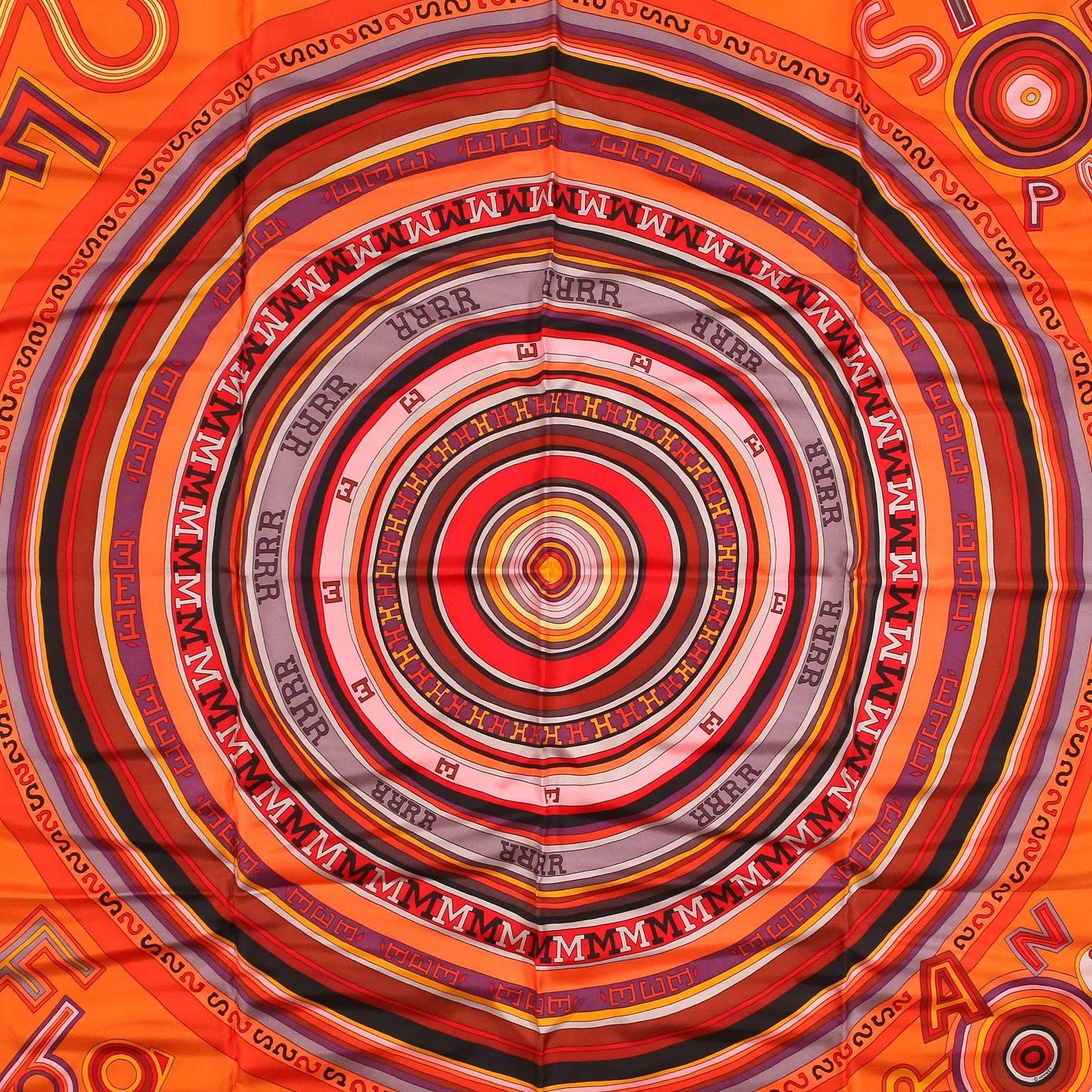 Hermès Orange Tohu Bohu 90 cm Silk Scarf - PRISTINE
 Designed by Claudia Stuhlhofer-Mayr and issued in 2004, it is one of the most coveted and collectible Hermès designs. 
Orange background with a concentric circular pattern and a puzzling array of