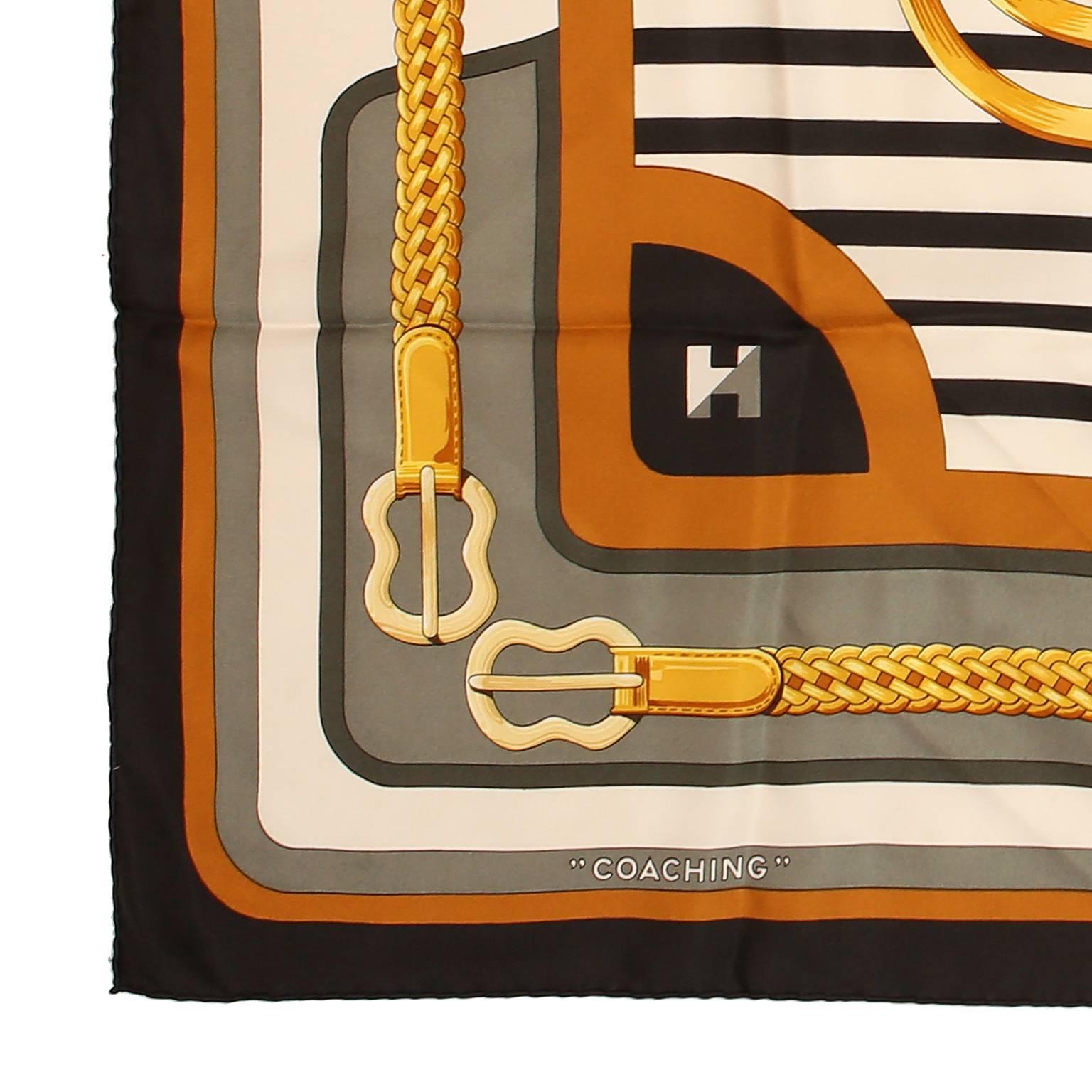 Hermès Coaching 90 cm Silk Scarf- PRISTINE
  Designed by Julie Abedie, this is a reissue of the original 1977 design.  Equestrian theme featuring belts, harnesses, and straps.  Creamy white background with black border, tan gold and grey.  100%