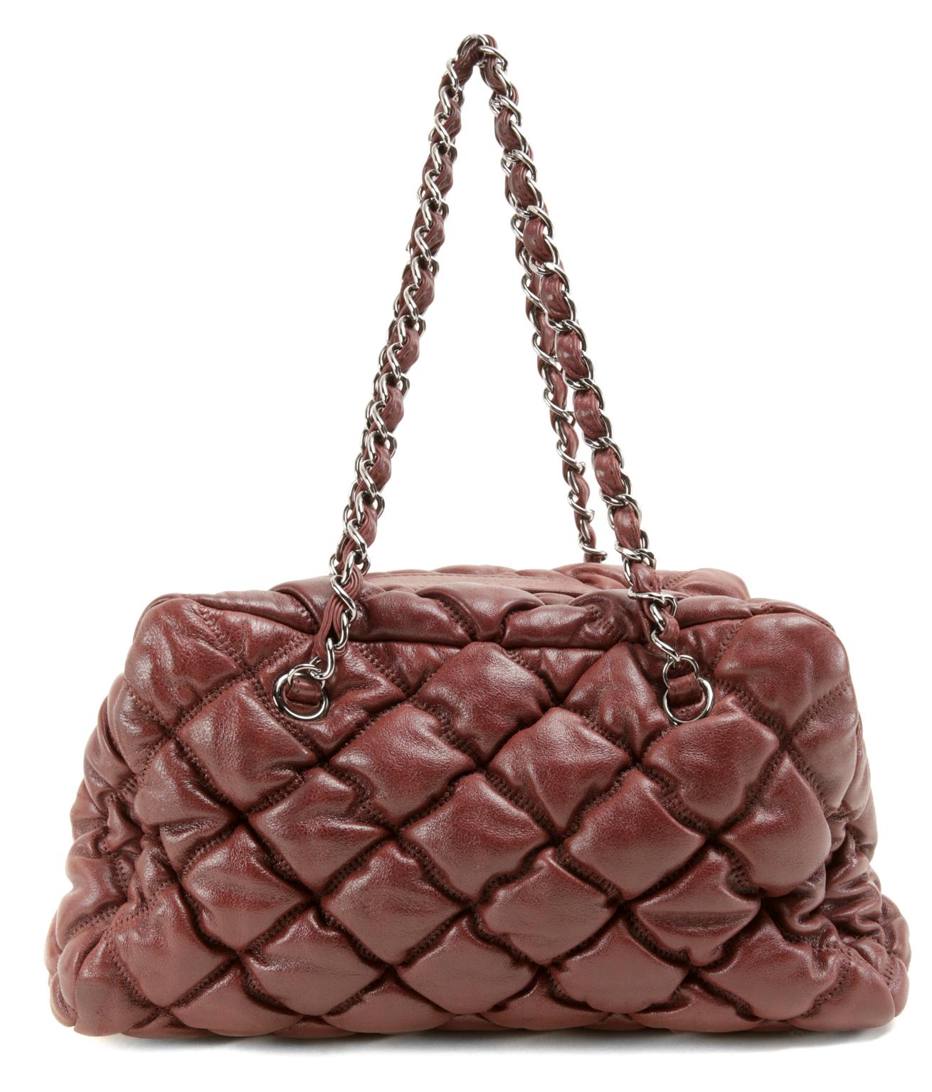 Chanel Wine Red Leather Bubble Bag- PRISTINE The striking color enhances the texture of the unique bubble quilting beautifully. Roomy but not unwieldy, this piece is perfect for every day enjoyment. Wine red leather is quilted in the extra puffy