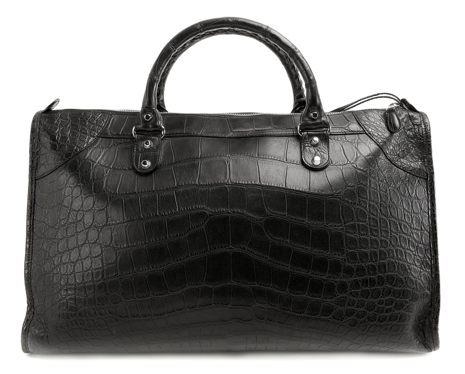 Balenciaga Black Crocodile Weekender- PRISTINE: appears never carried The iconic moto inspired design elements are all present in this incredible unisex travel bag. Matte black crocodile skin large carryall is accented with silver tone hardware.