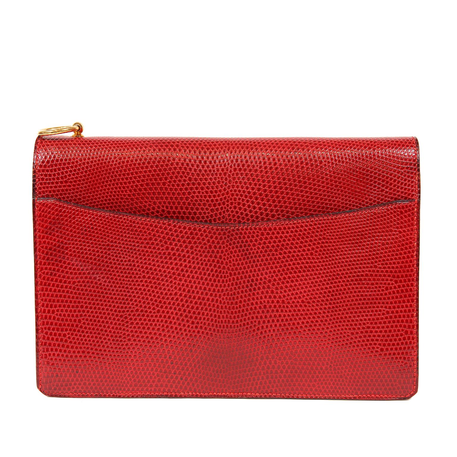 Hermès Red Lizard Vintage Medor Clutch- MINT; Rare and Collectible
The exotic skin (the horizontal line – next to the Hermès stamp indicates lizard skin) adds a new dimension to the striking red color.  
Optional shoulder strap adds versatility. 