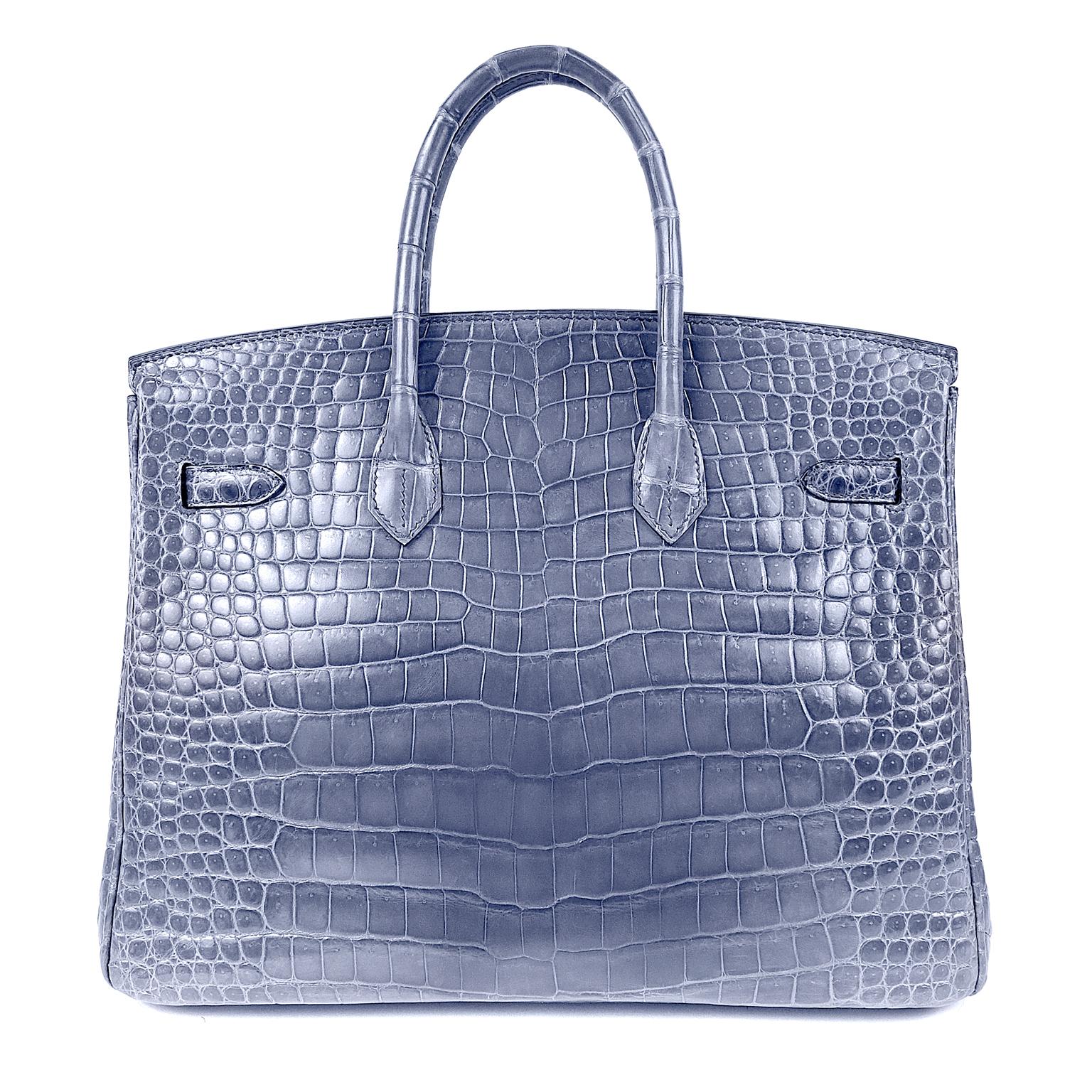 Hermès Blue Brighton Porosus Crocodile 35 cm Birkin Bag- Pristine Condition; meticulously stored.     
Hermès bags are considered the ultimate luxury item the world over.  Hand stitched by skilled craftsmen, wait lists of a year or more are