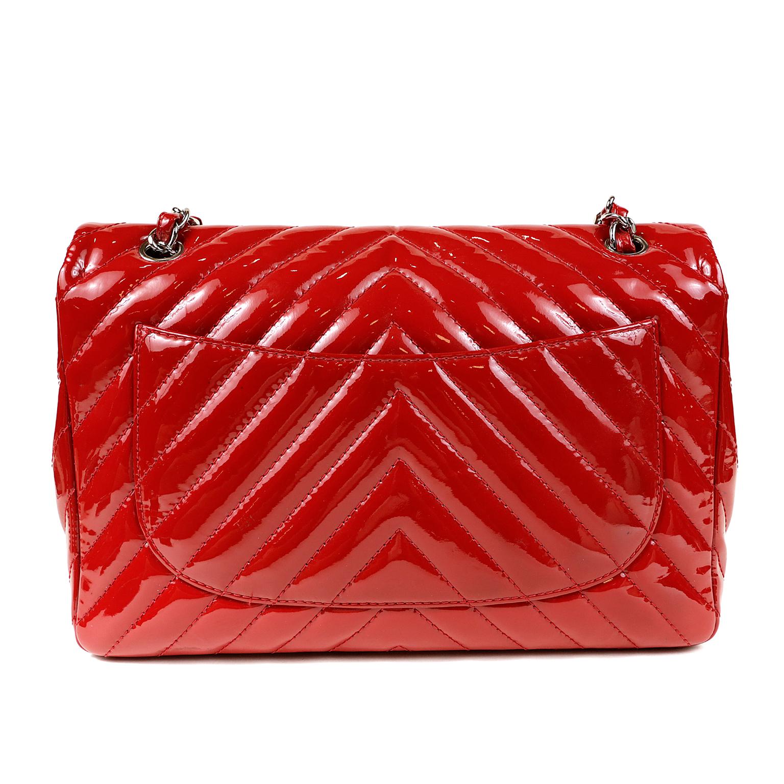 Chanel Red Patent Leather Chevron Jumbo Flap Bag- Pristine Condition
 Striking and beautiful, it is a brilliant addition to any collection.
Lipstick Red durable patent leather is quilted in chevron  pattern.  Silver interlocking CC twist lock