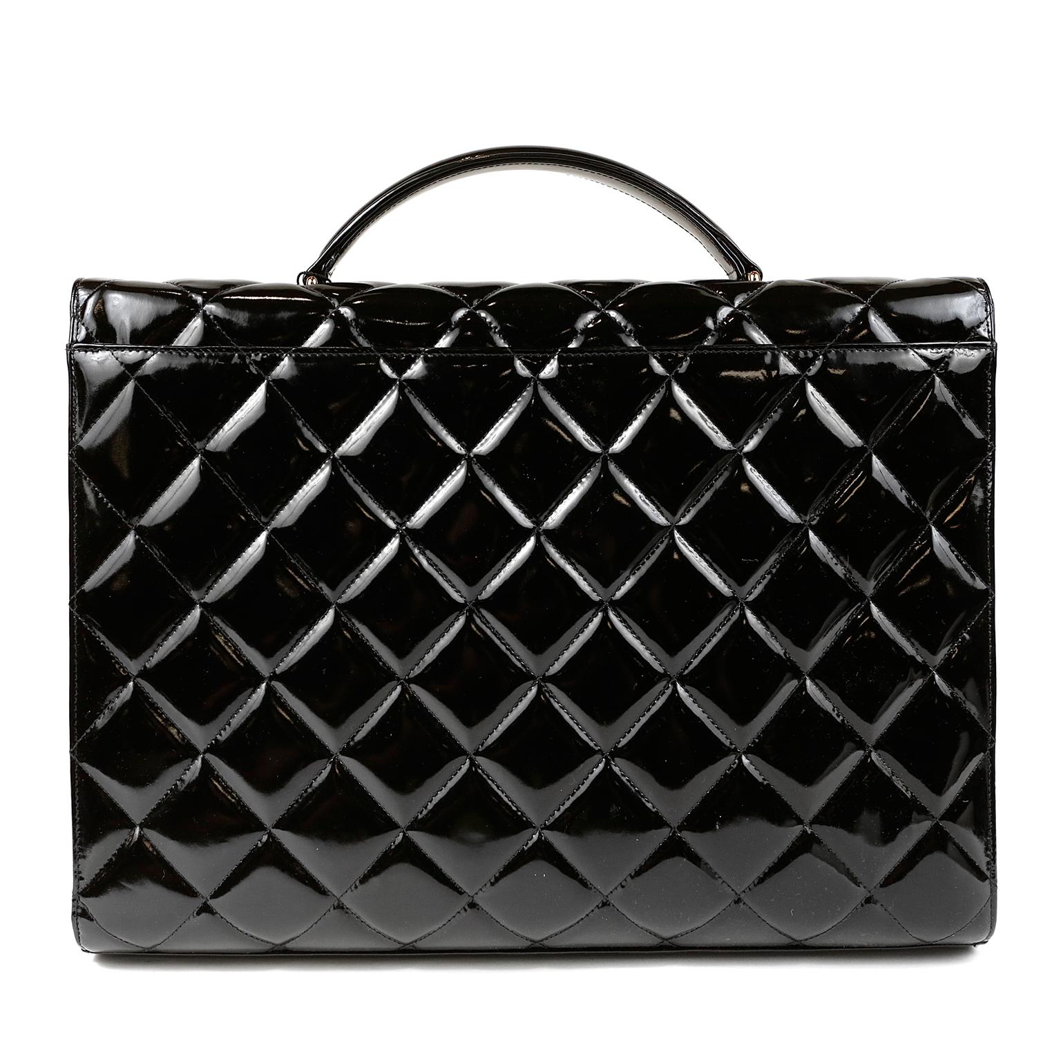 Chanel Black Patent Leather Vintage Brief Case- Mint condition
 From the mid 1990’s, it is a spectacular find.  
Glossy and durable black patent leather is quilted in signature Chanel diamond pattern.  Oversized gold interlocking CC twist lock