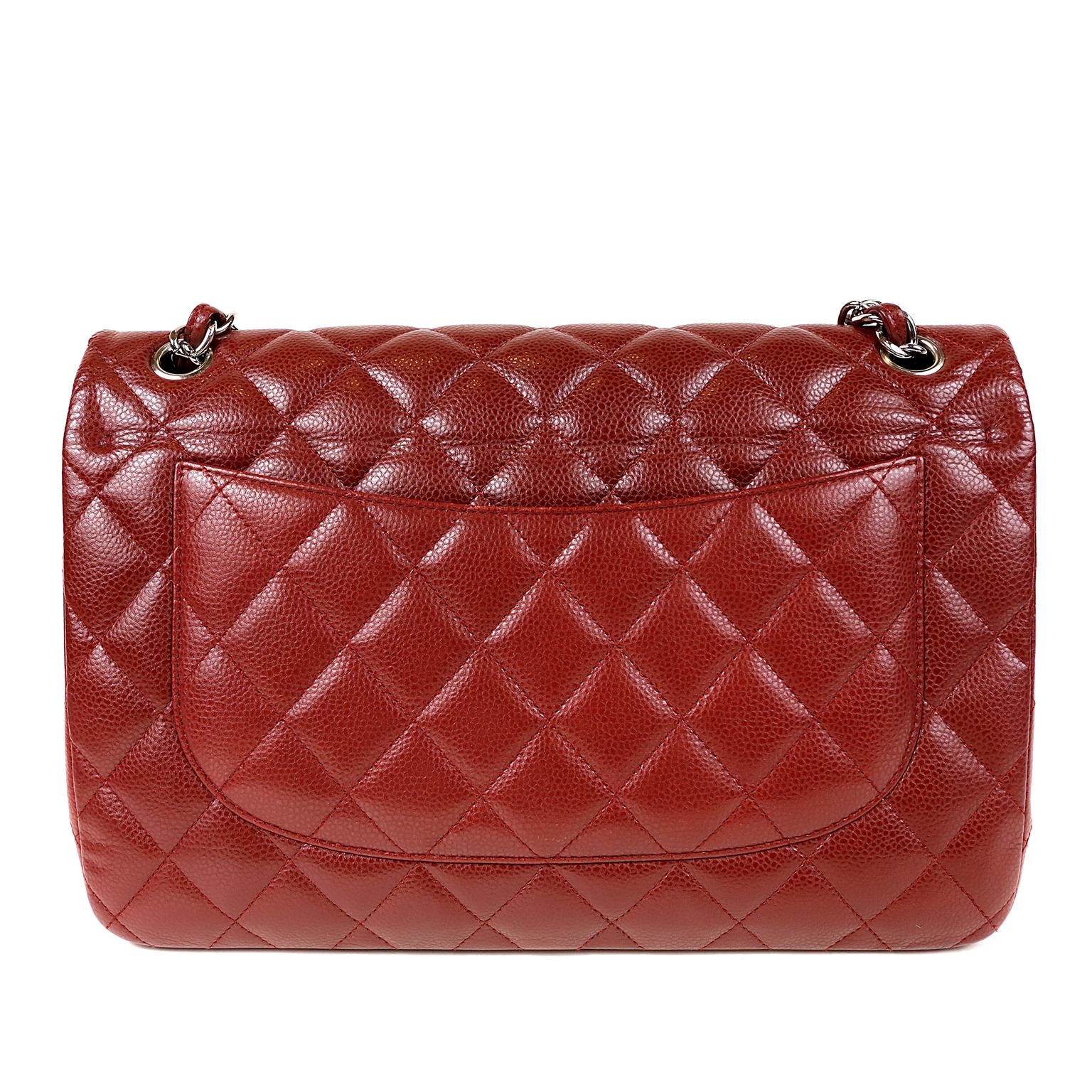 Chanel Red Caviar Jumbo Classic Double Flap Bag- Pristine; appears never carried
Particularly stunning in a deep red paired with silver hardware.  
Durable and textured dark red caviar leather is quilted in signature Chanel diamond pattern.  Silver