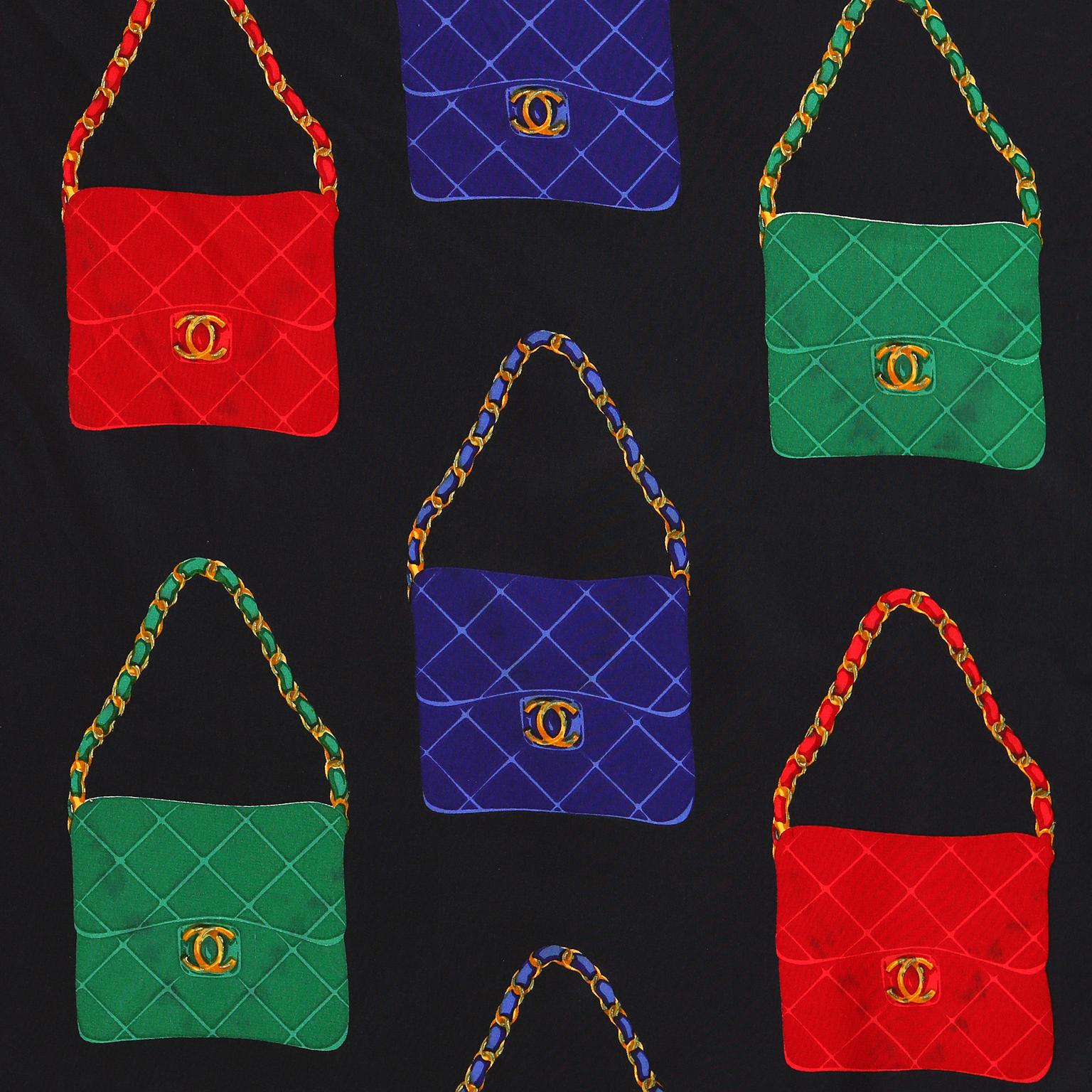 This authentic Chanel Silk Handbags Scarf is in excellent condition.  Black background with a red border.  Red, blue and green classic flaps create the pattern. 100% silk.
Measurements: 34” x 34”
A407
