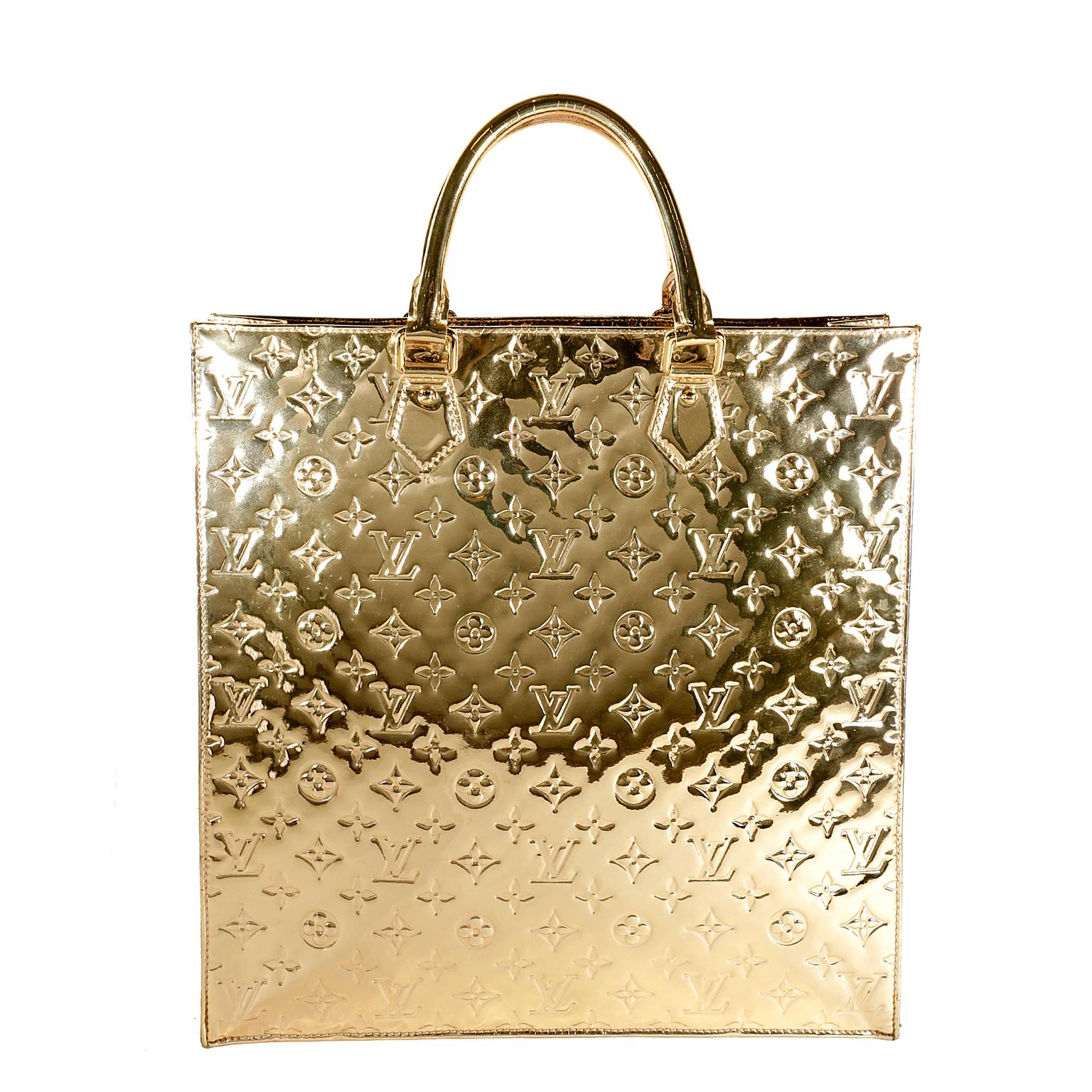 Louis Vuitton Gold Miroir Monogram Sac Plat Tote- Excellent Condition; Limited Edition from the 2006-2007 Collection.  
Gold patent leather is embossed in signature Louis Vuitton monogram pattern.  Mirrored finish. Spotlessly clean fabric interior. 
