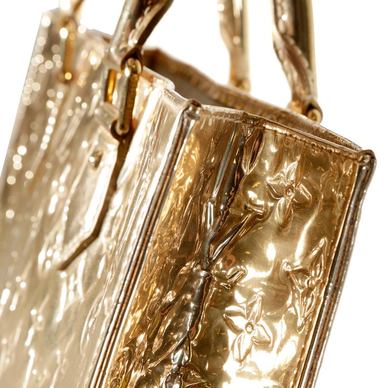 Sold at Auction: Louis Vuitton, LOUIS VUITTON 'MIROIR SAC PLAT' GOLD VERNIS  TOTE