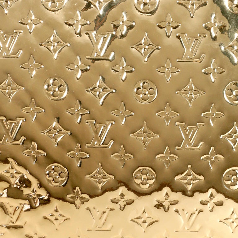 A Louis Vuitton Limited Edition Gold Monogram Miroir Sac Plat Bag, 14.25 x  15 x 4. sold at auction on 26th October