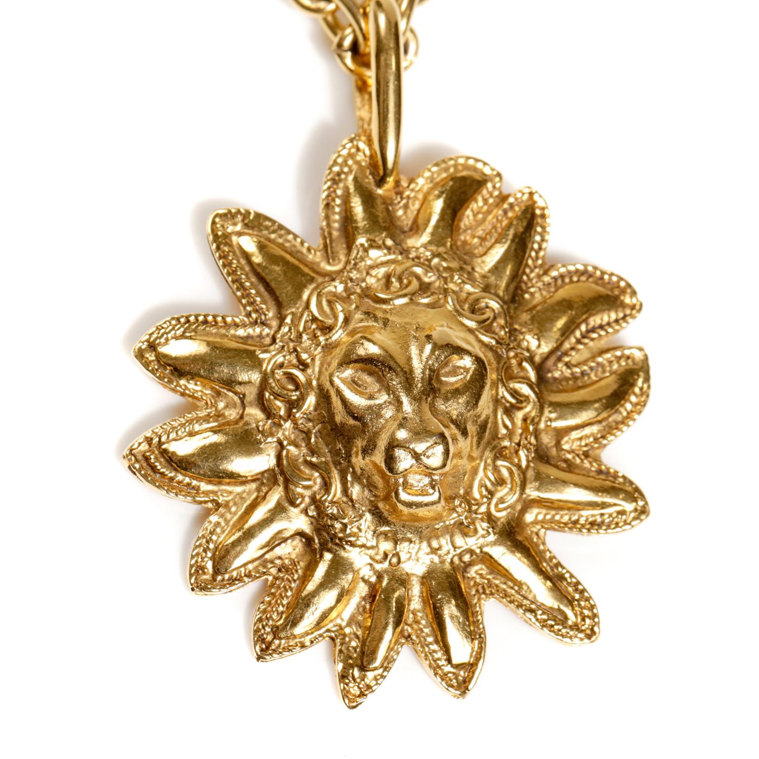 Chanel Gold Lion Sun Leo Vintage Necklace is in excellent condition.  From the 1980’s, it is a true classic.  Wearable with everything from t shirts to evening gowns.  
Gold tone large sun pendant with lion face.  Long gold tone linked chain with