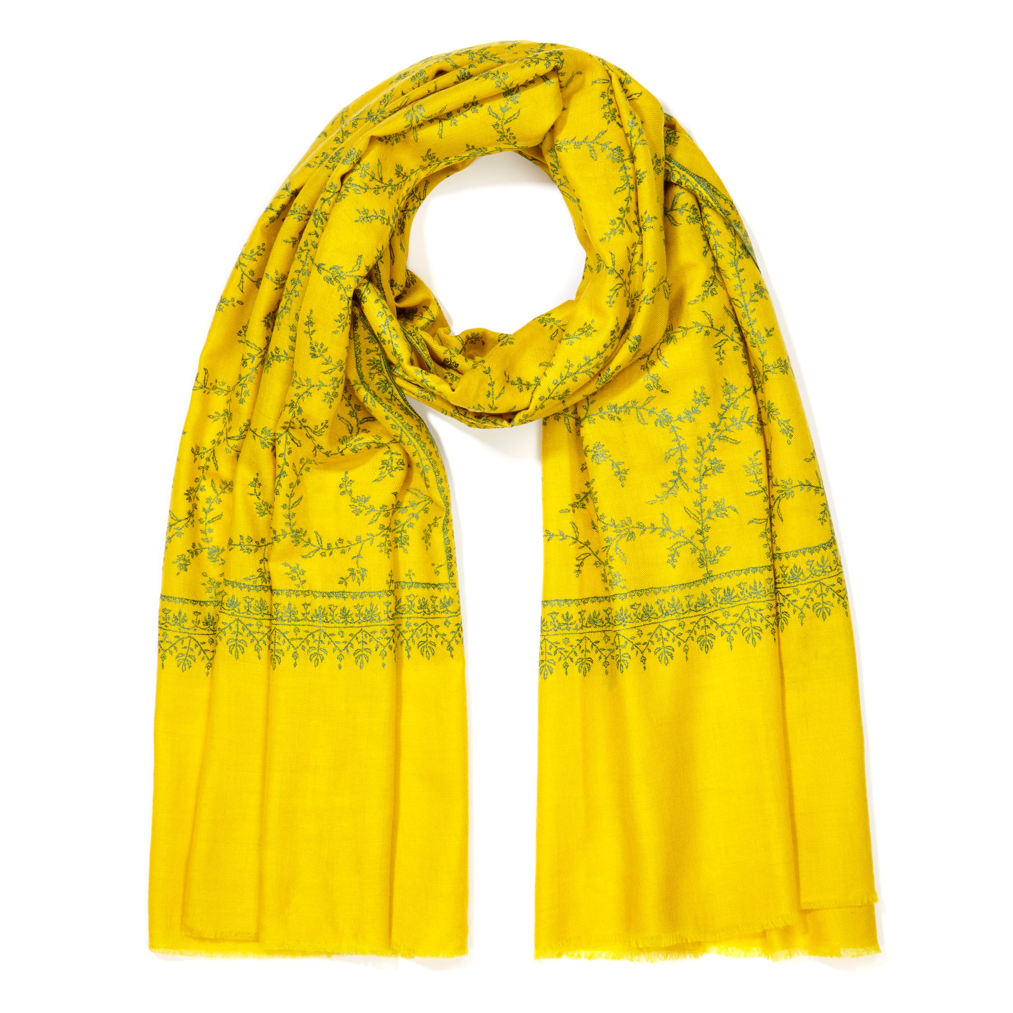 Hand Embroidered 100% Cashmere Scarf in Yellow Made in Kashmir India 

Verheyen London’s shawl is spun from the finest embroidered woven cashmere from Kashmir.  The embroidery can take up to 1 year to embroider and each one is unique. Its warmth