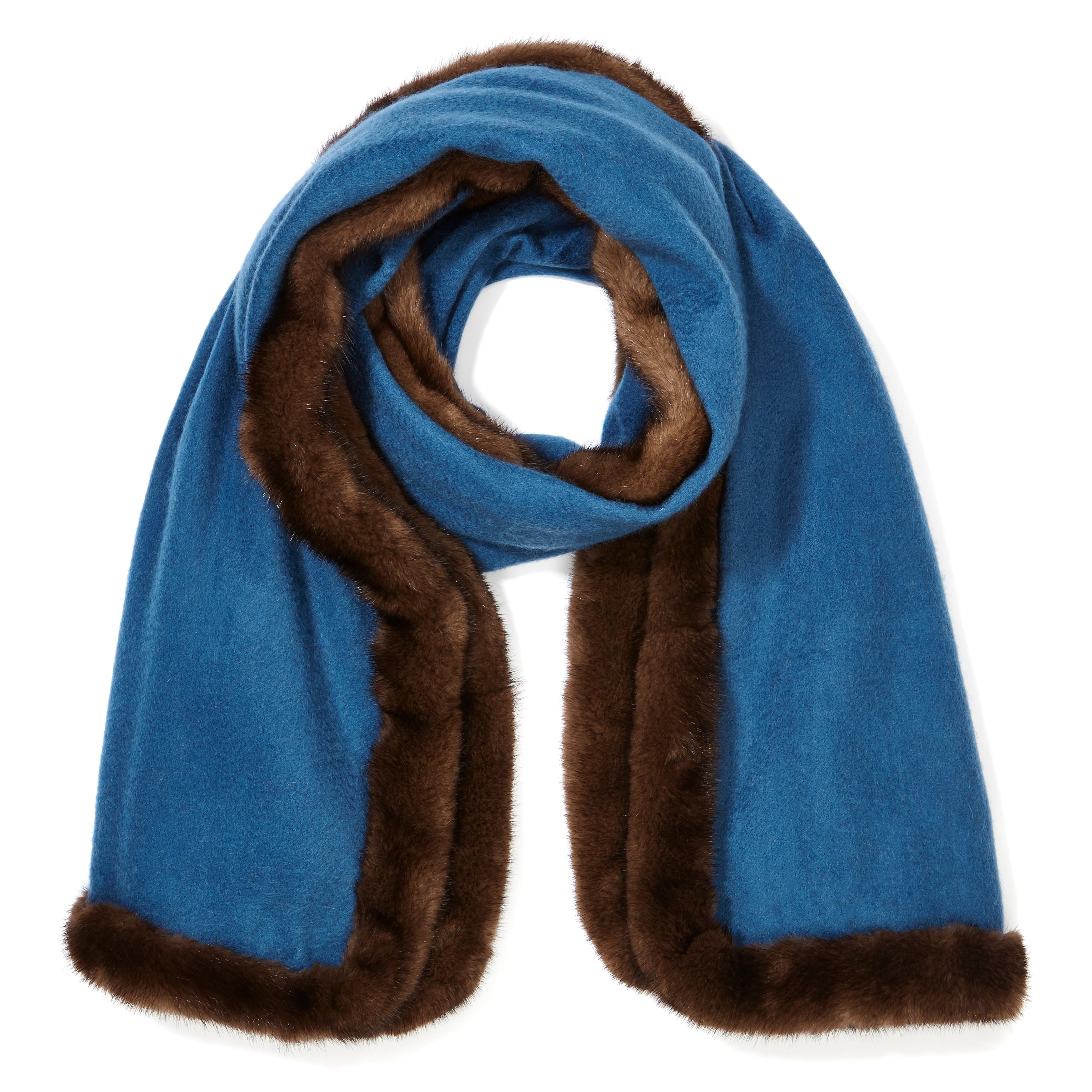 Verheyen London Mink Fur Trimmed Cashmere Scarf in Blue & Brown - Brand New

Verheyen London’s shawl is spun from the finest Scottish woven cashmere and finished with the most exquisite dyed mink. Its warmth envelopes you with luxury, perfect for