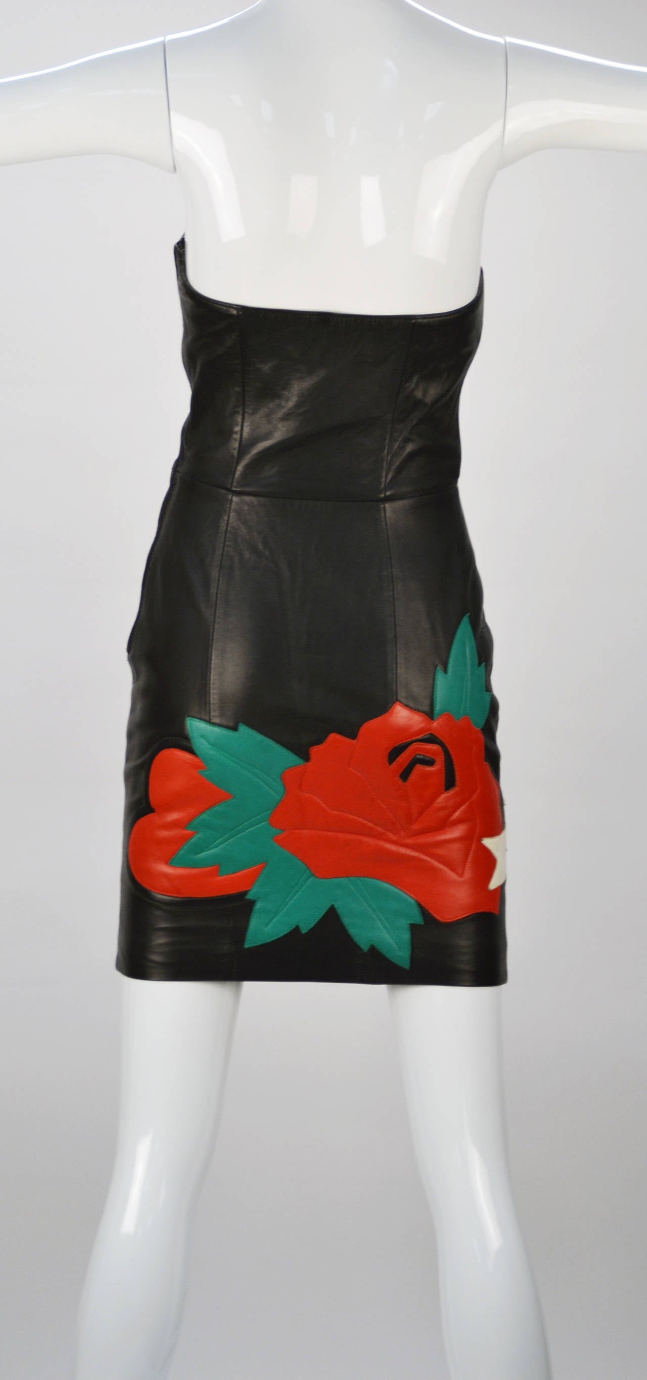 Knock out! Iconic North Beach Leather, True Love bustier dress.  Black Mirabella Lamb with quilted red, green and white leather.  Red rose and heart motif with embroidered 