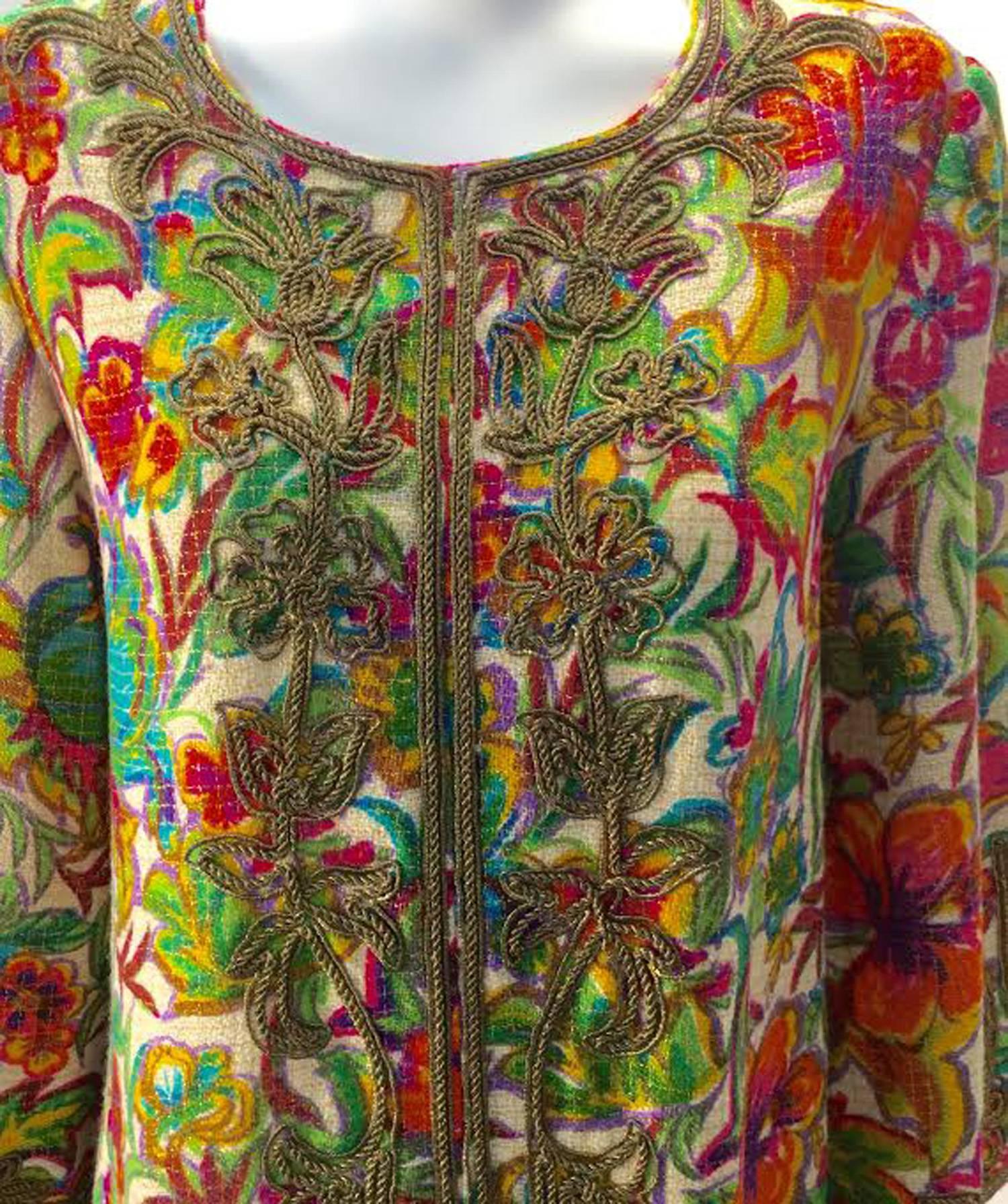 Vintage Floral multi-colored embroidered Kaftan by Malouf Design.  Known as the maker of the "perfect negligee" Malouf design brought the Kaftan to the U.S. and allowed collector's of vintage to bring Malouf designs to day wear.  

This