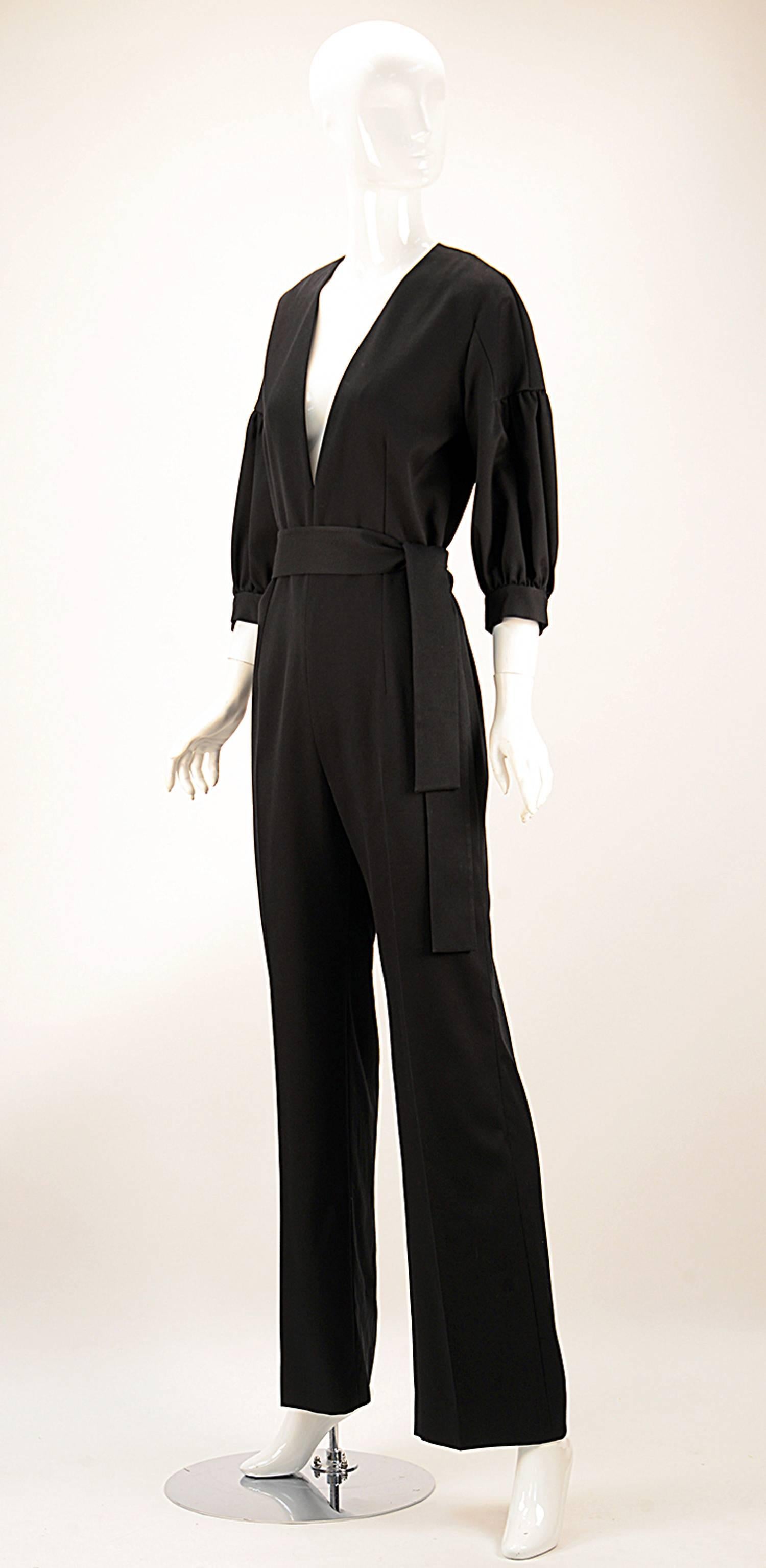 Perfect, new with tags black jumpsuit from YSL from the spring/summer 2014 collection.  Dress it up...dress it down.... wear it by day.... wear it in the evening....wear it winter, spring, summer or fall.... wear this 
