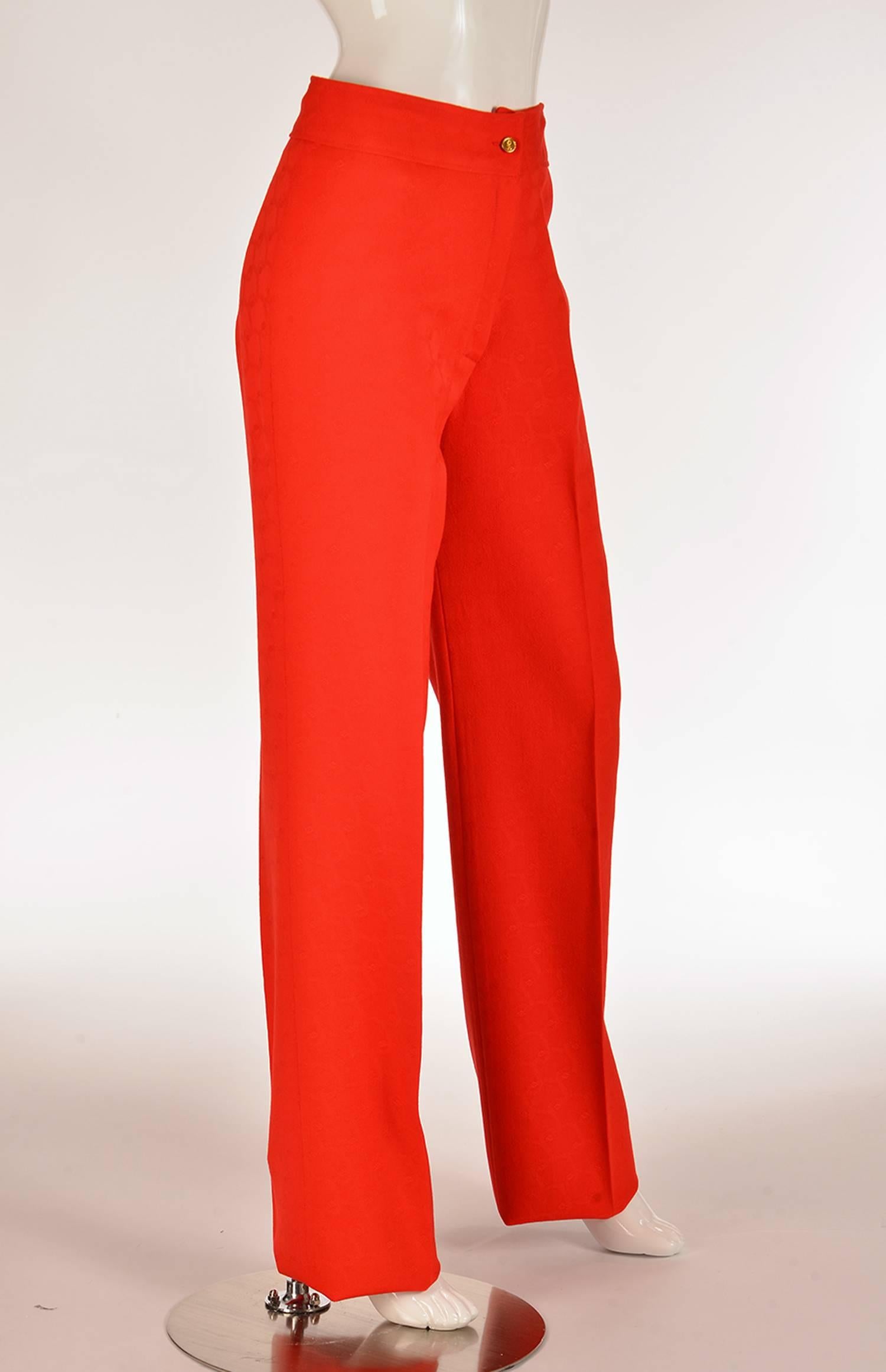 Vintage red wool trousers with Roberta di Camierno signature fabric consisting of buckles and belts printed all over the pants. Flat front. Gold metal button stamped with her logo. Zip front.

Modern Us Size 6-8. See measurements.

*All garments and