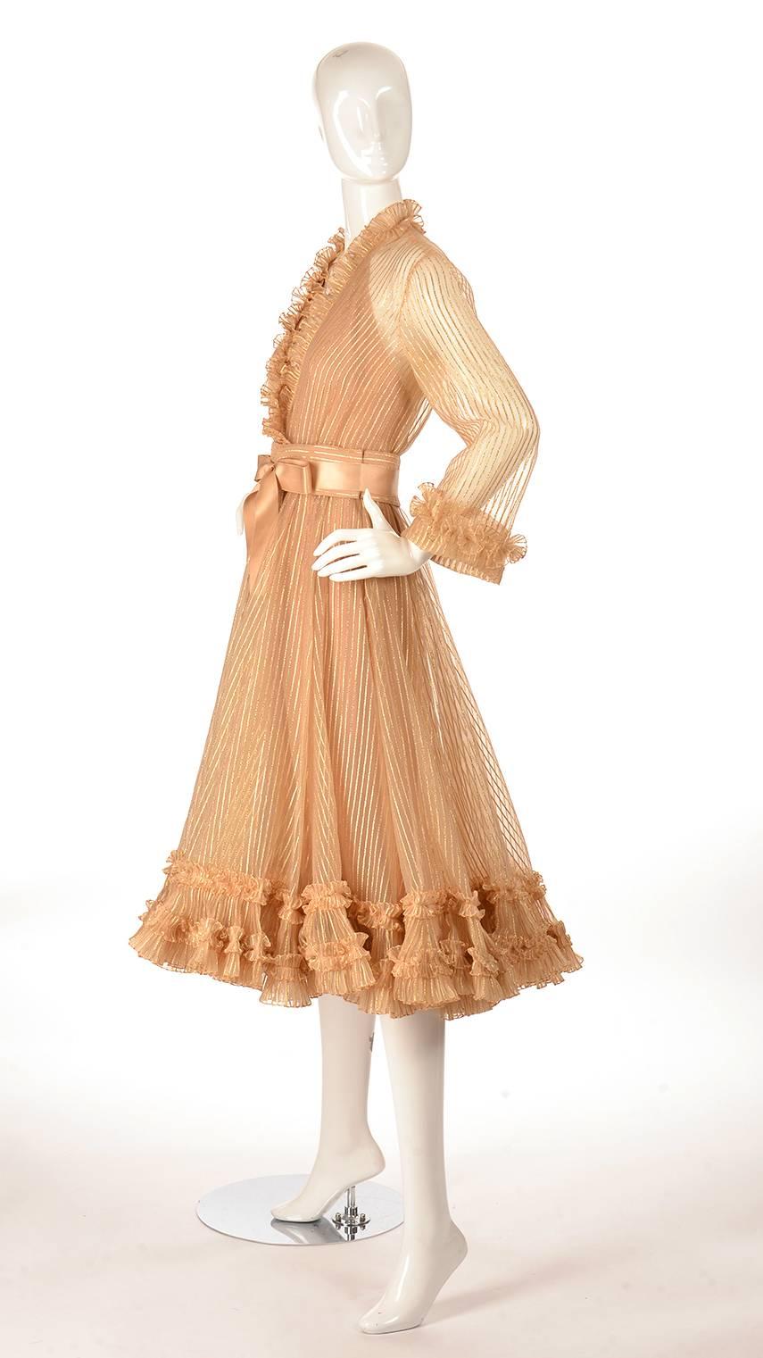 This stunning, immaculately preserved 1973 Fall/Winter cocktail dress was designed by Marc Bohan for Christian Dior. The dress is numbered 