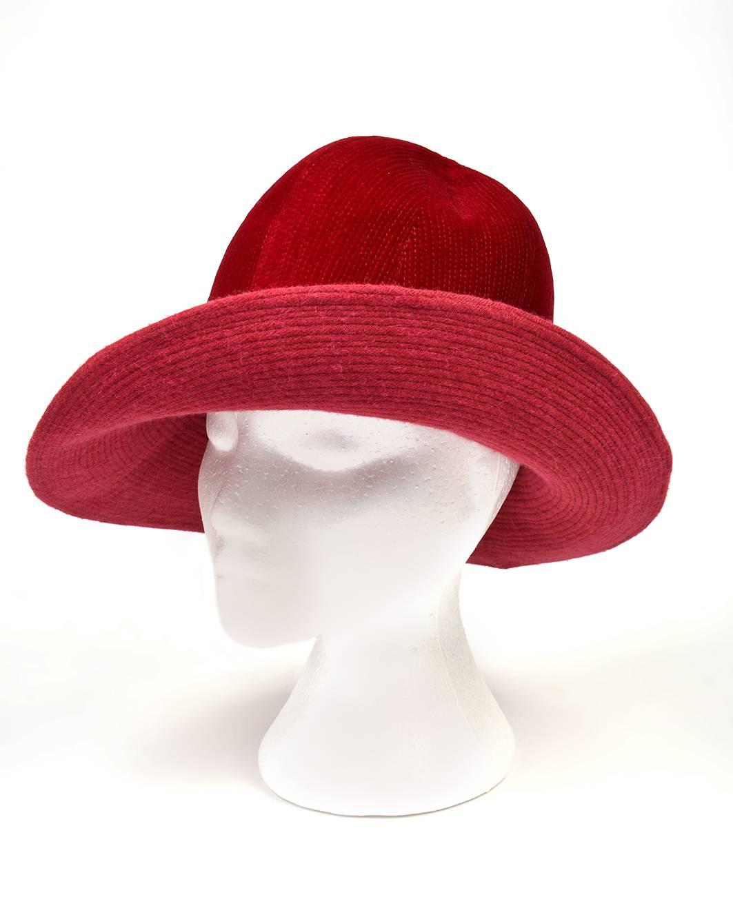 1970s Atelier Lucas Velvet Cranberry Red Hat

Gorgeous 1970s cranberry red hat by Atelier Lucas for Lord and Taylor. This sumptuous velvet hat is entirely decorated in thin stitched lines. The stitches curving along the brim, and create a