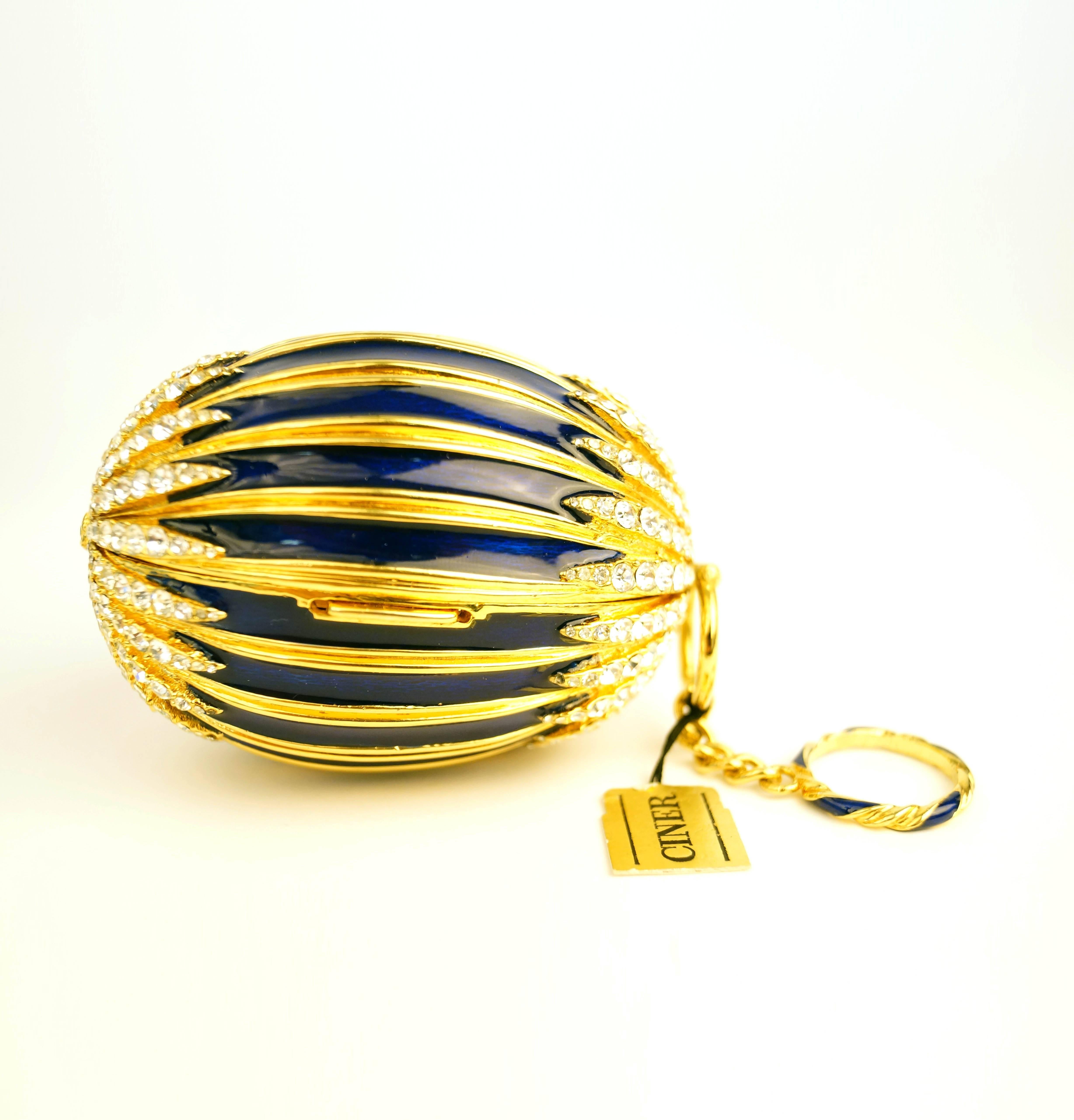 Women's or Men's Ann Miller's 1950s Ciner Enamel and Rhinestone Egg Minaudiere Compact For Sale